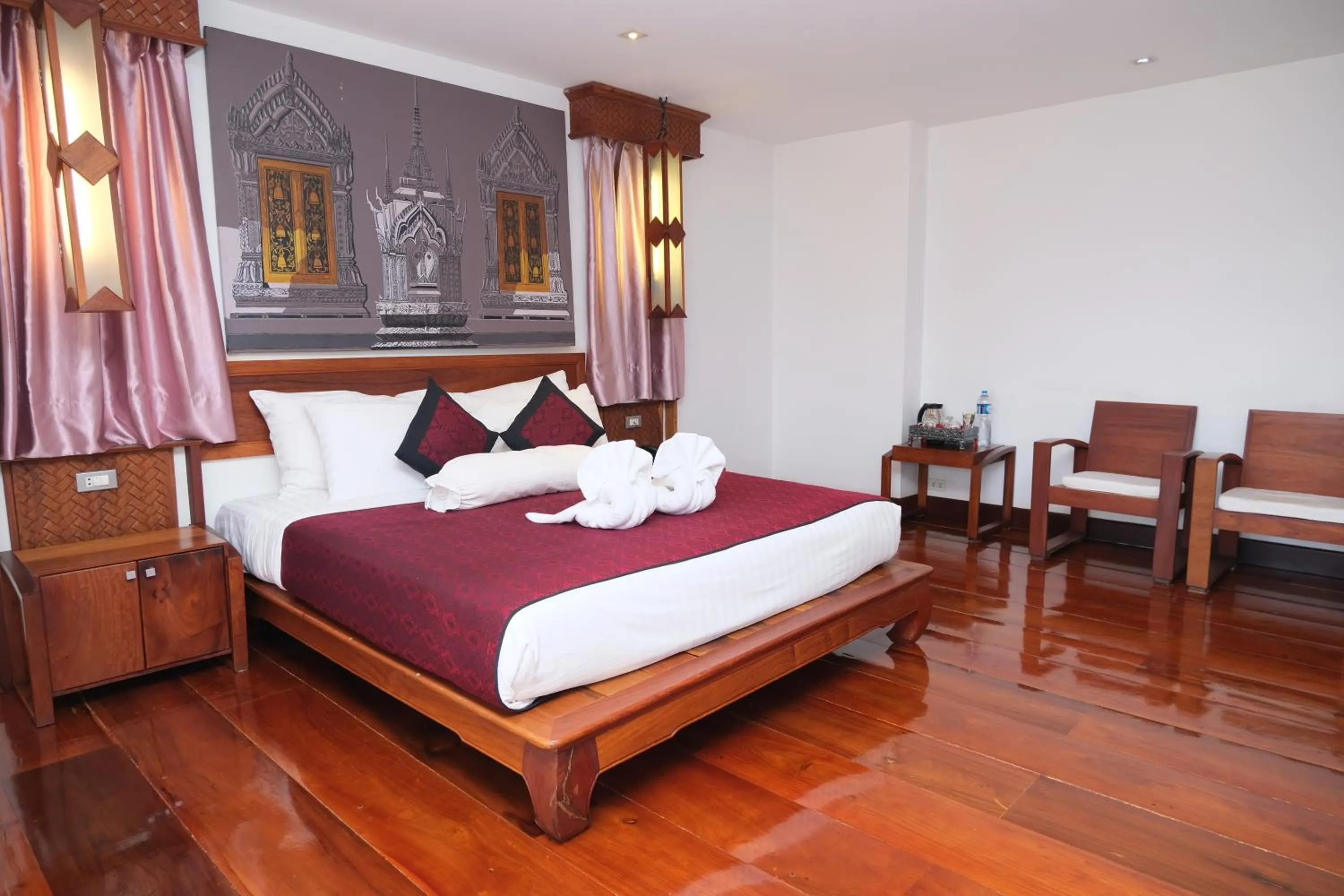 Bed in Chanthapanya Hotel