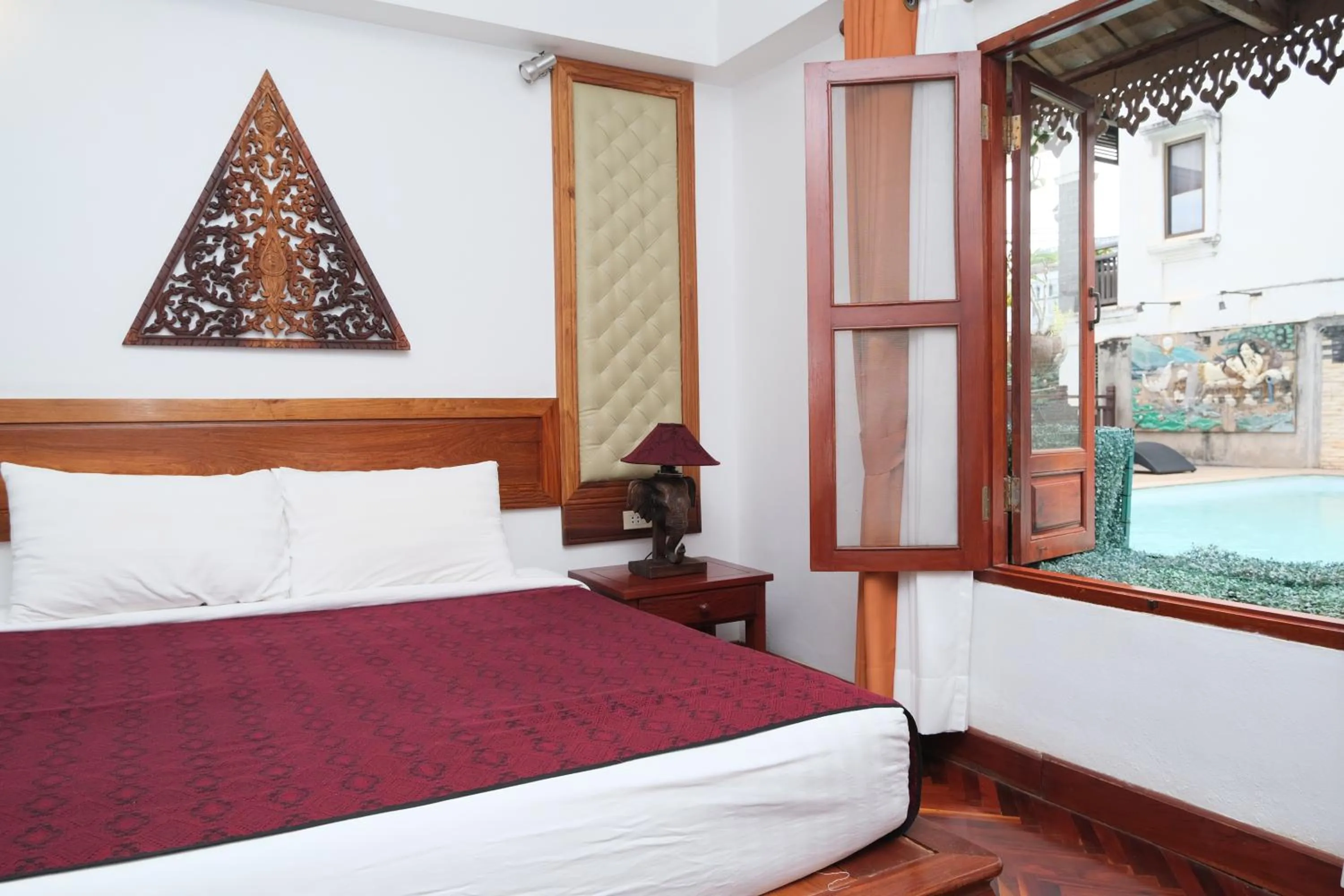 Bed in Chanthapanya Hotel