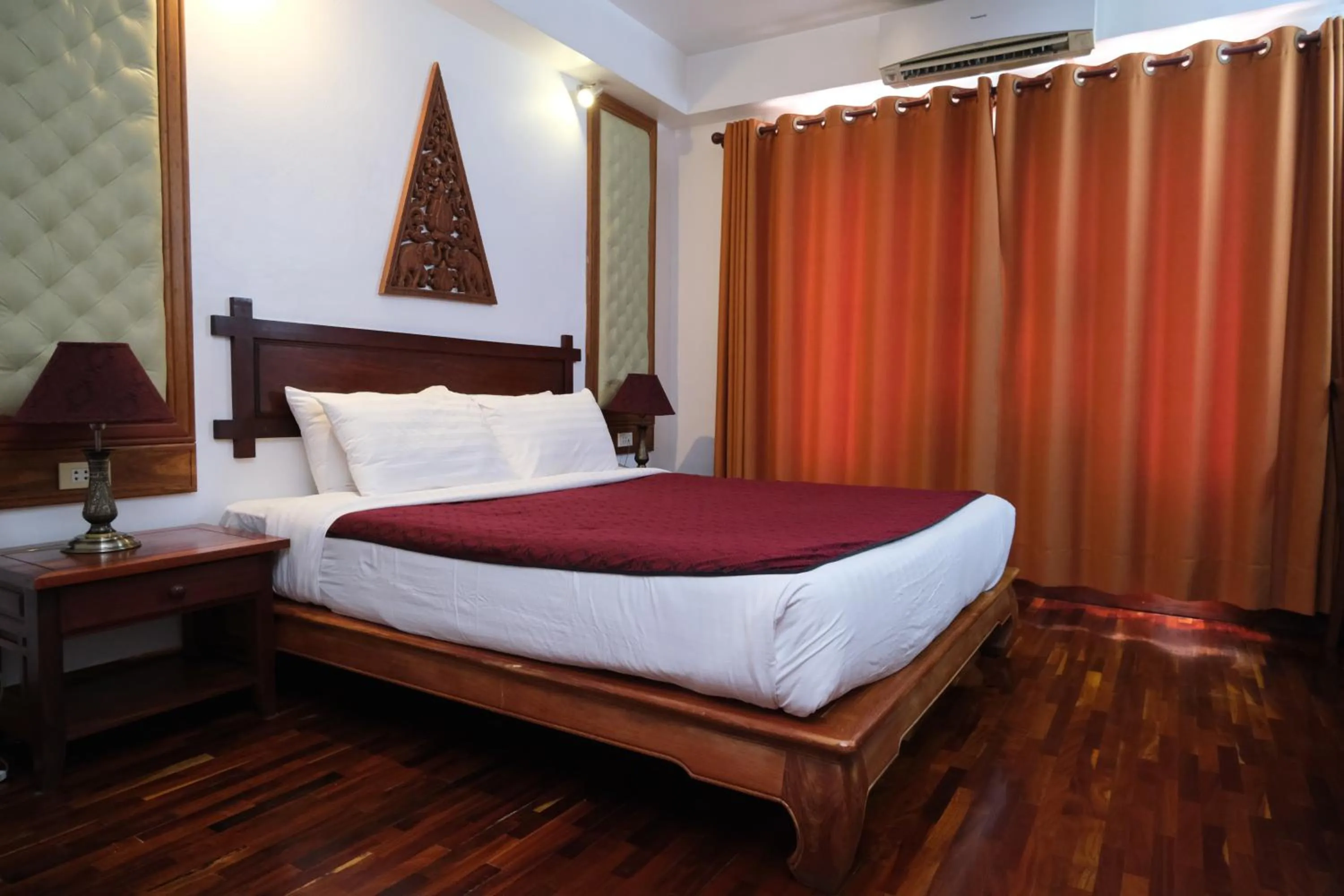 Bed in Chanthapanya Hotel