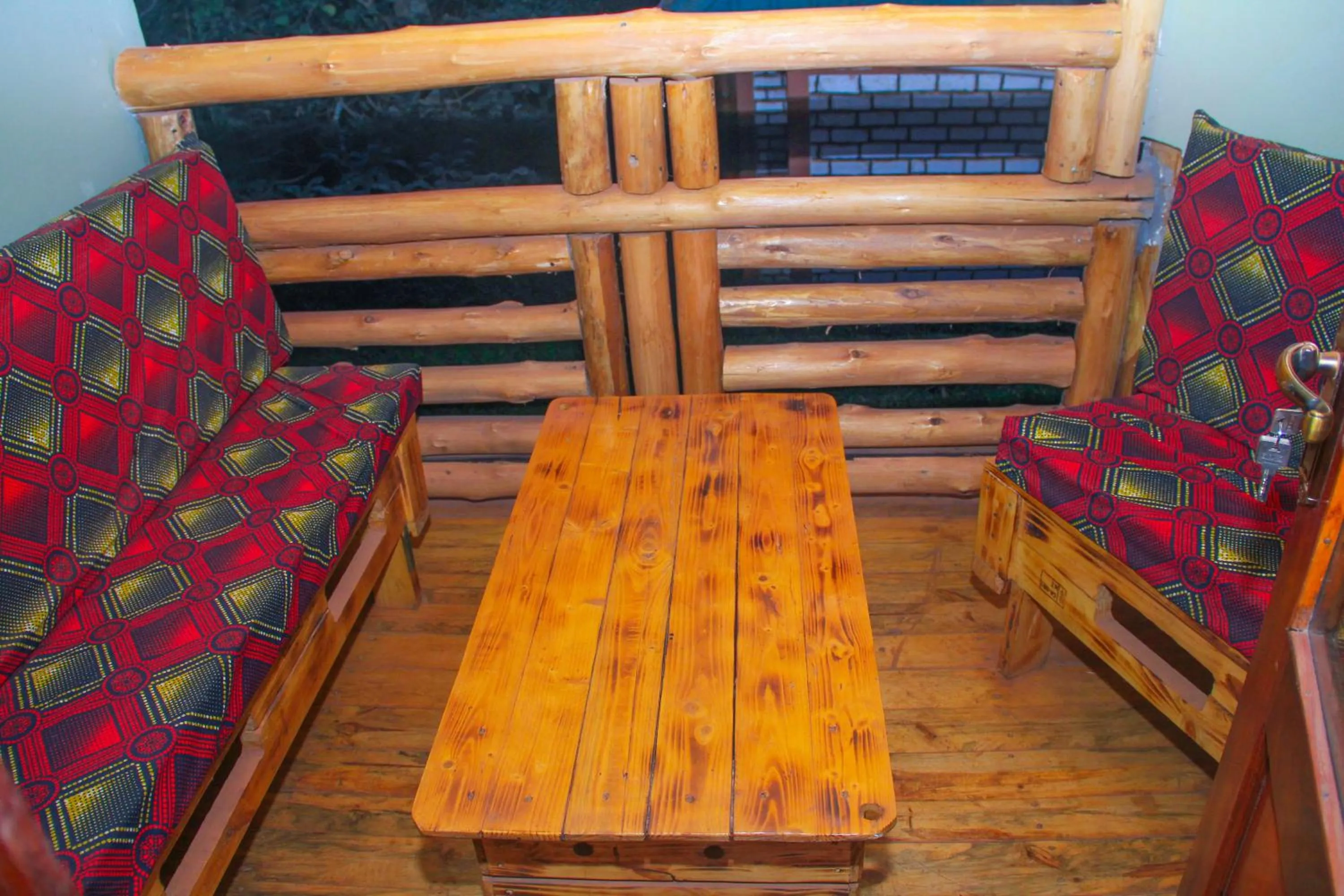 Seating area in Elite Backpackers Services