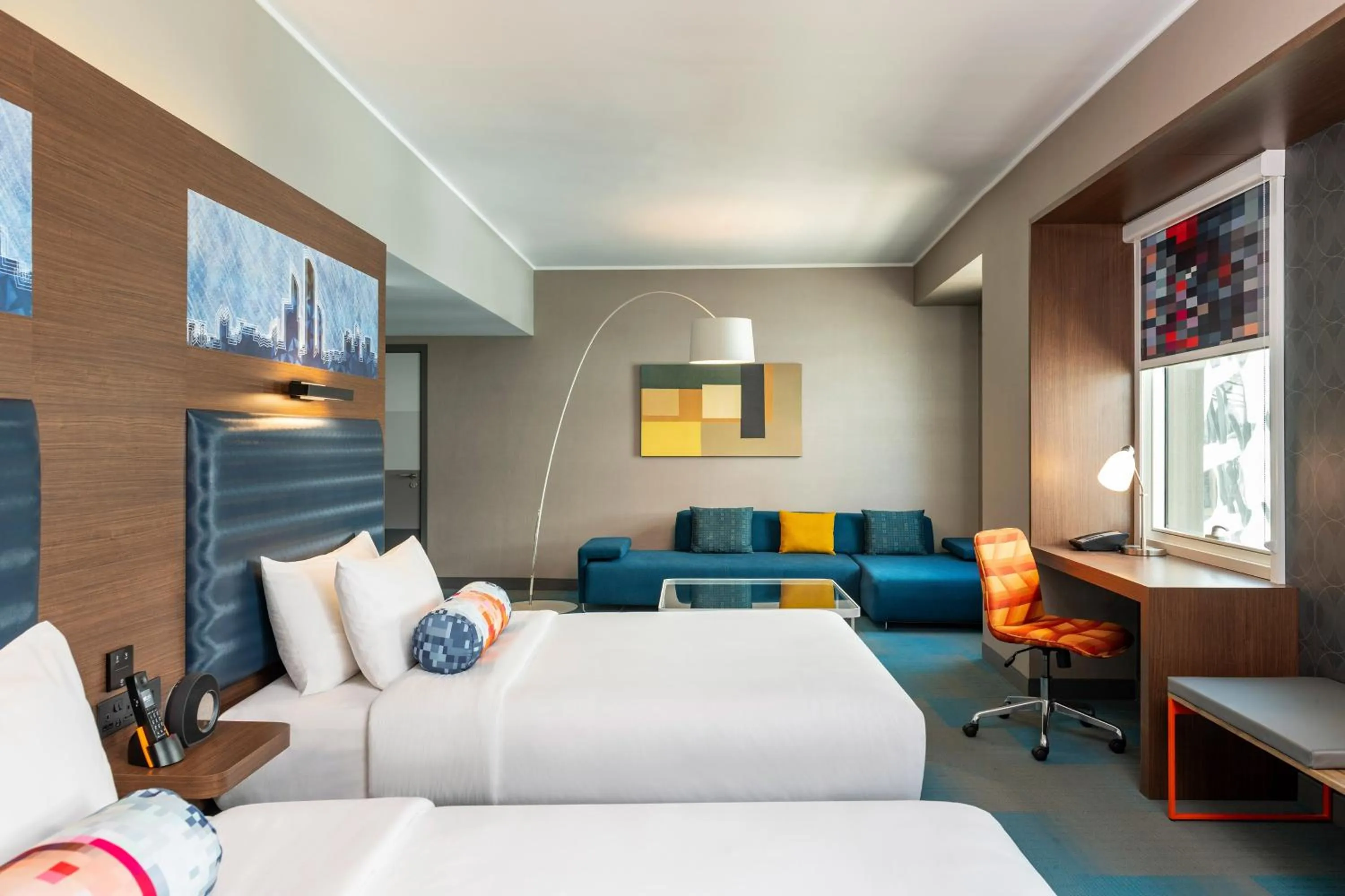 Photo of the whole room, Bed in Aloft Al Ain