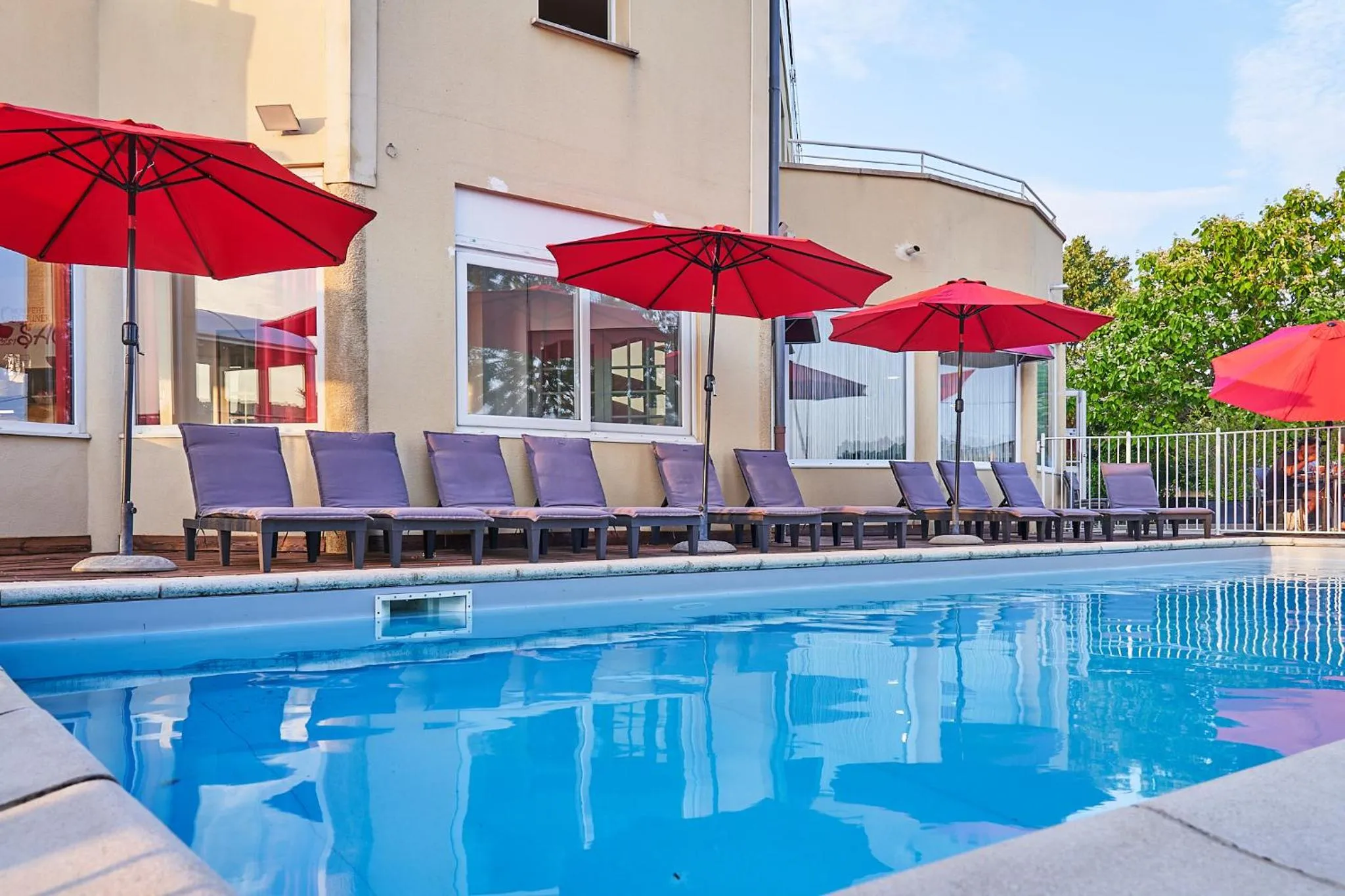 Swimming pool in Authentic by balladins Dijon / Marsannay-la-Côte