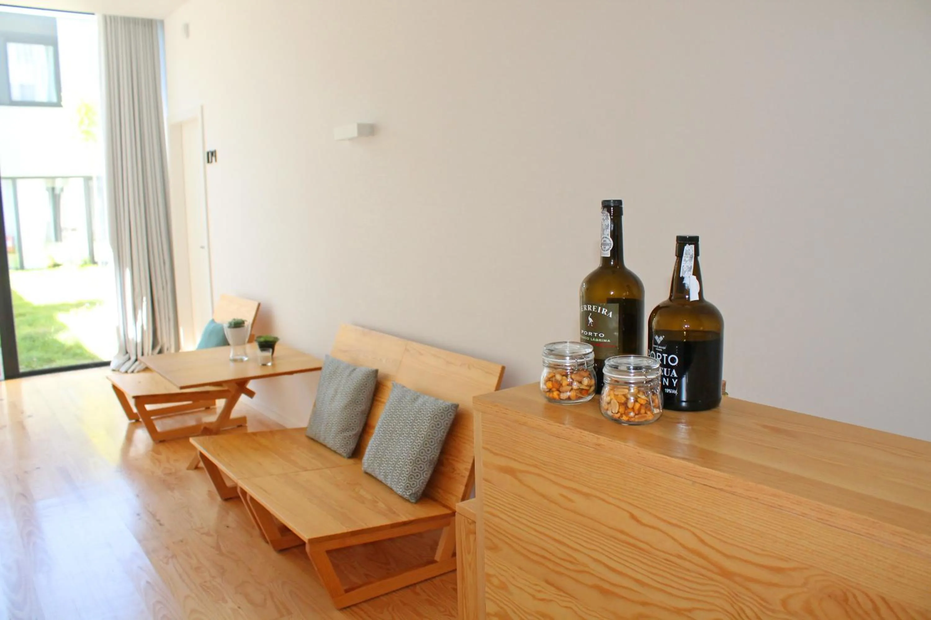 Communal lounge/ TV room in Boavista Class Inn