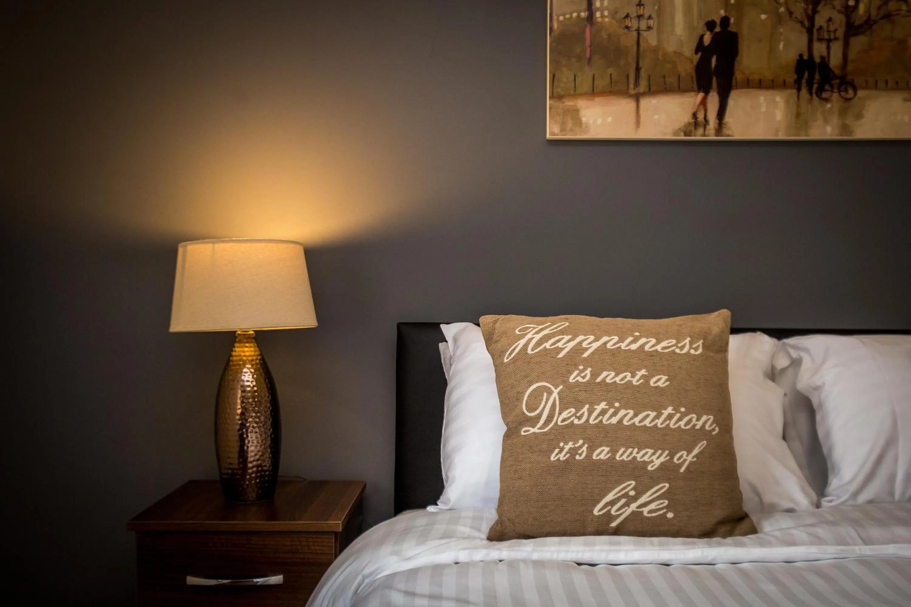 Decorative detail, Bed in Mica Point City Centre Apartment