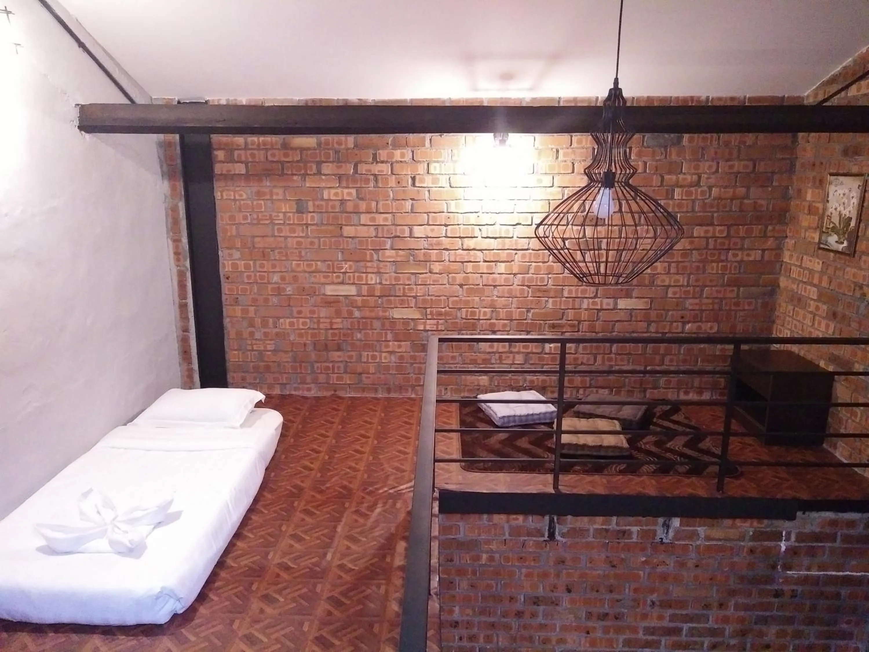 Bed in JQ Ban Loong Boutique Hotel