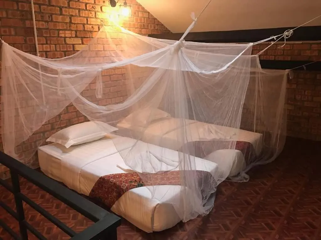 Bed in JQ Ban Loong Boutique Hotel