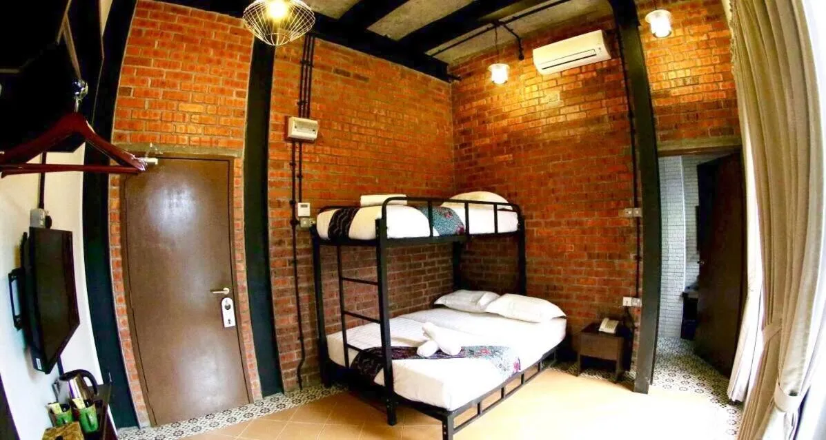 Bed in JQ Ban Loong Boutique Hotel