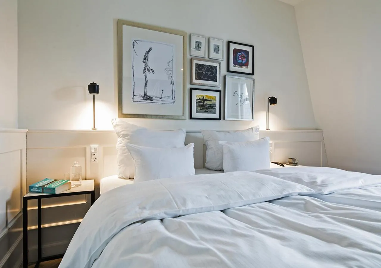 Bed in Hotel Kong Arthur