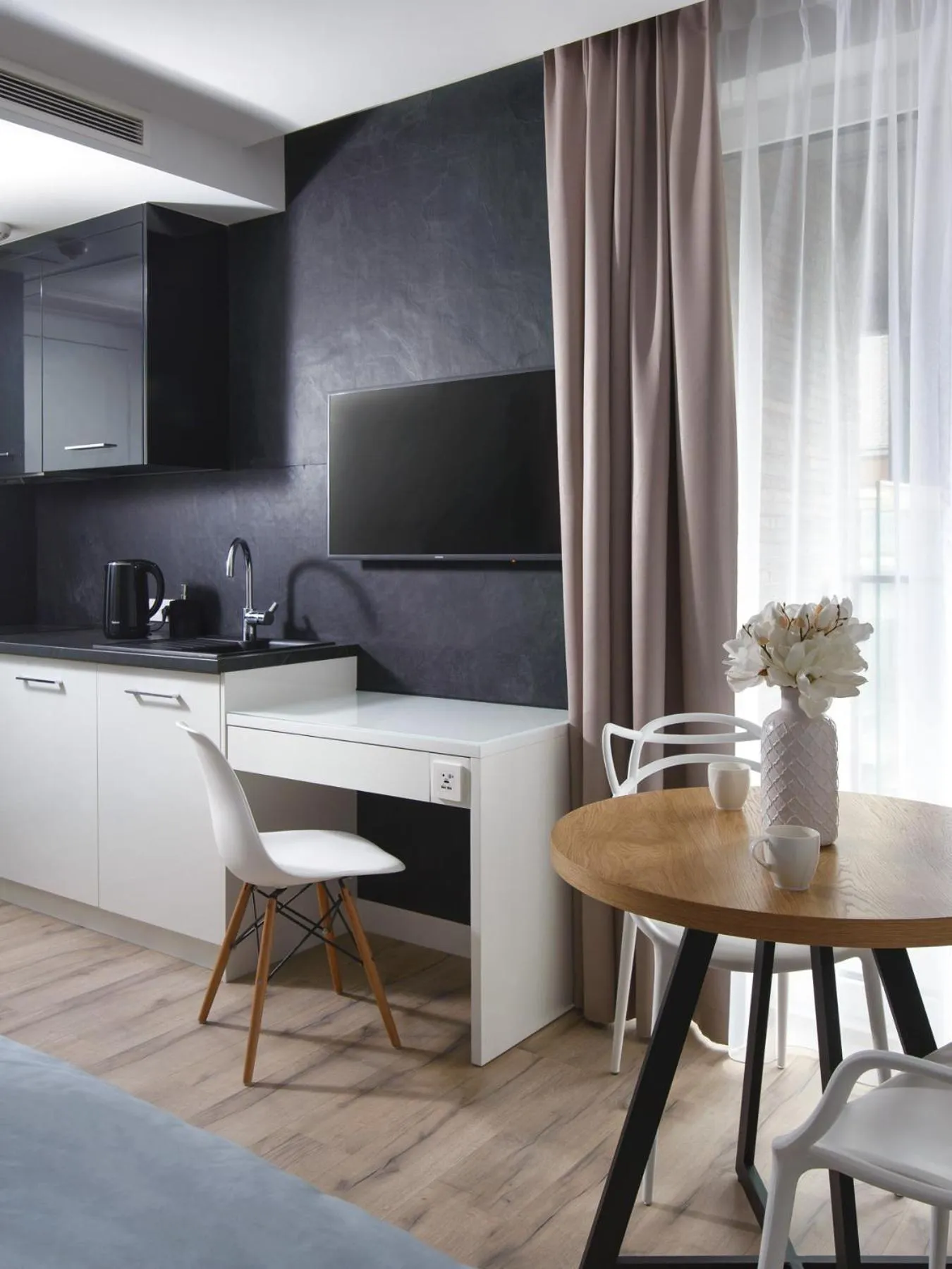 Kitchen or kitchenette in My Story Sopot Apartments