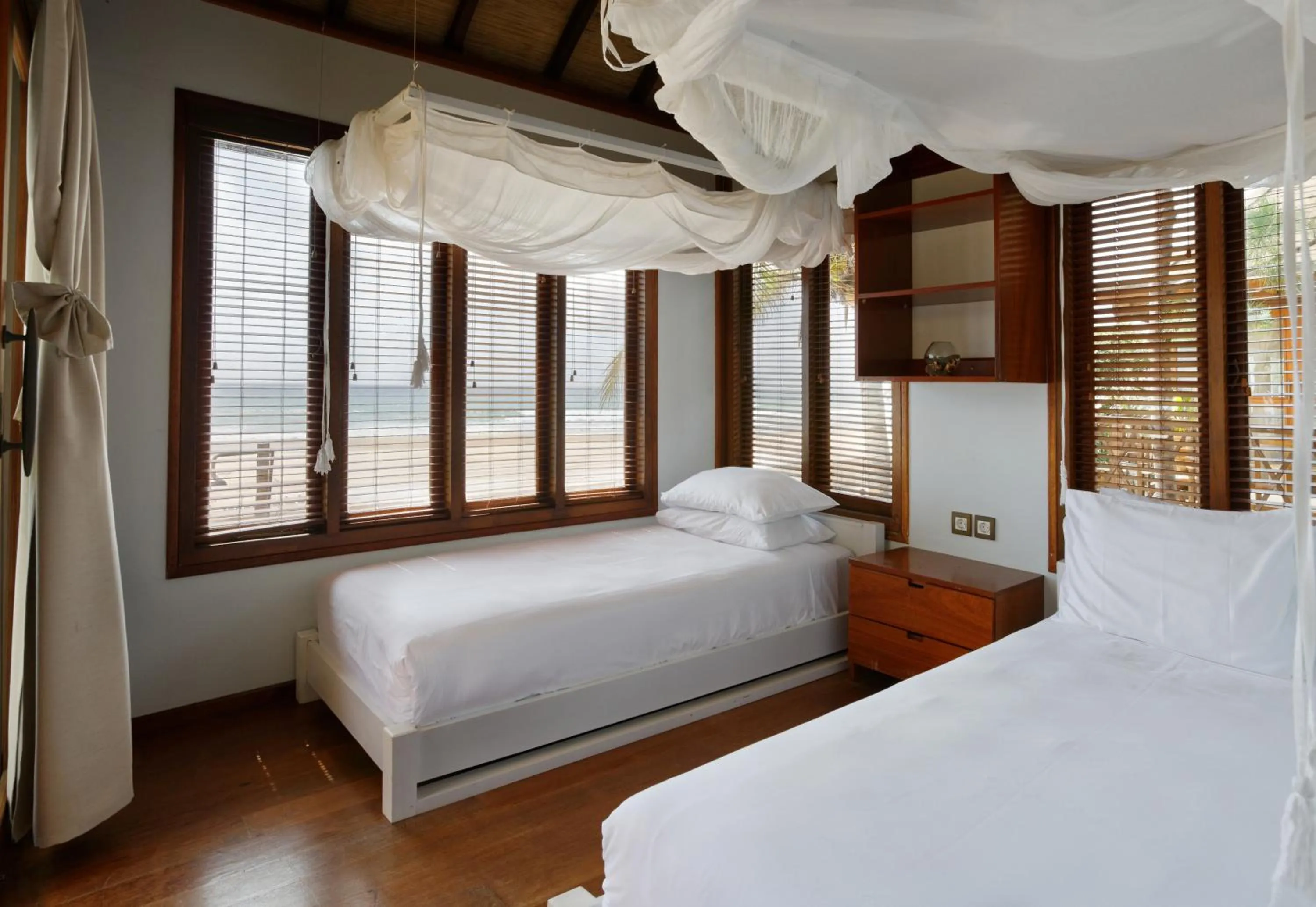 Bed in Sentidos Beach Retreat