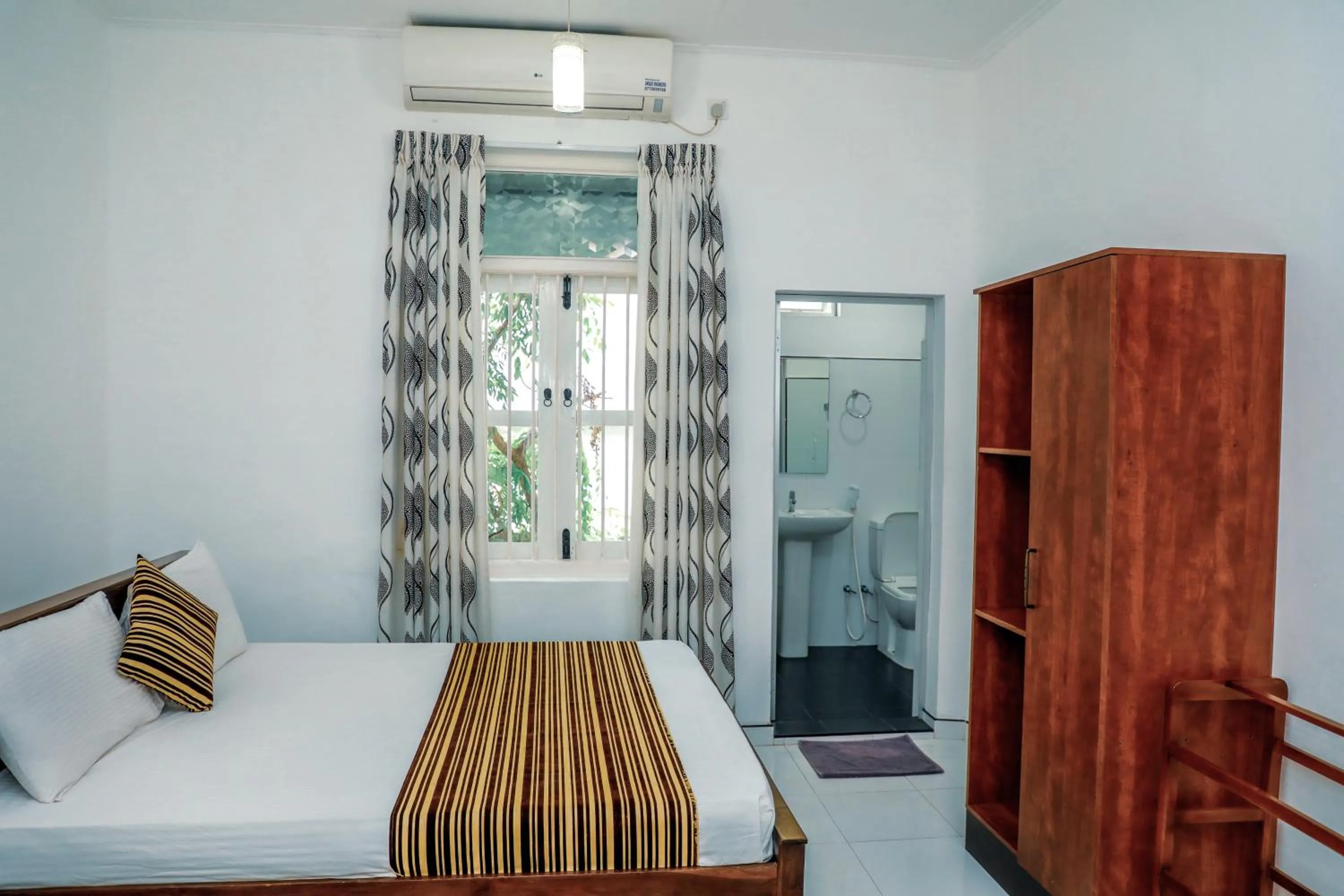 Bed in Bon Voyaage Tourist Inn