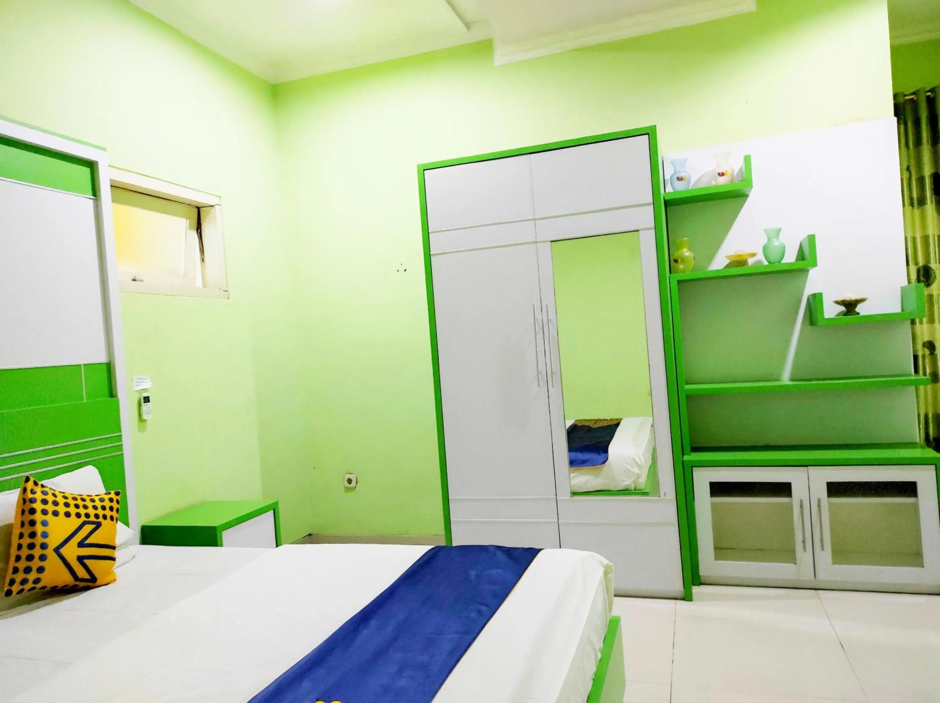 Bedroom in Radio Backpacker Guesthouse Syariah