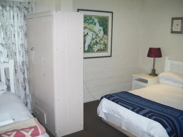 Bed in Nutmeg Guest House