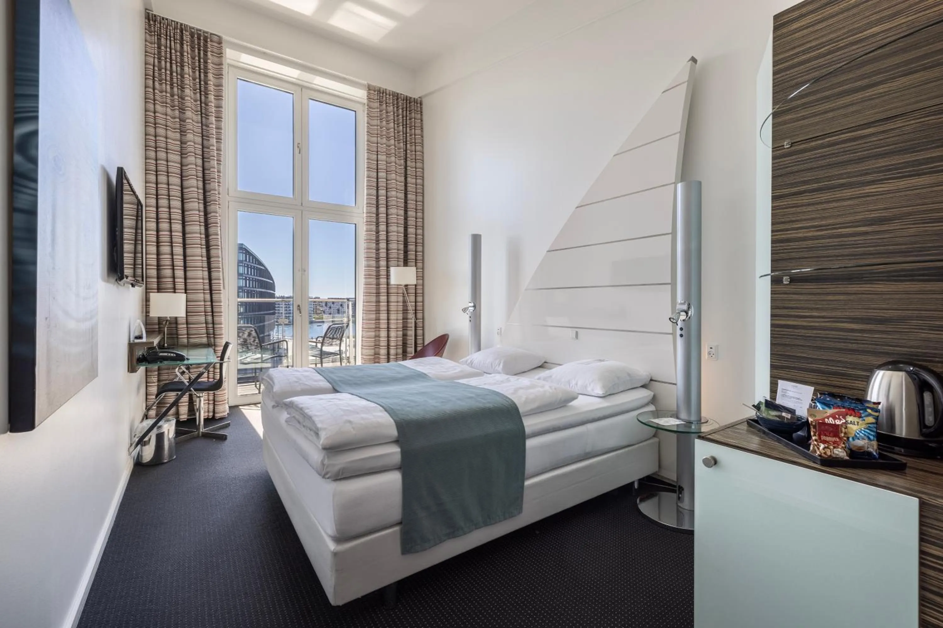 Bed in Copenhagen Island Hotel