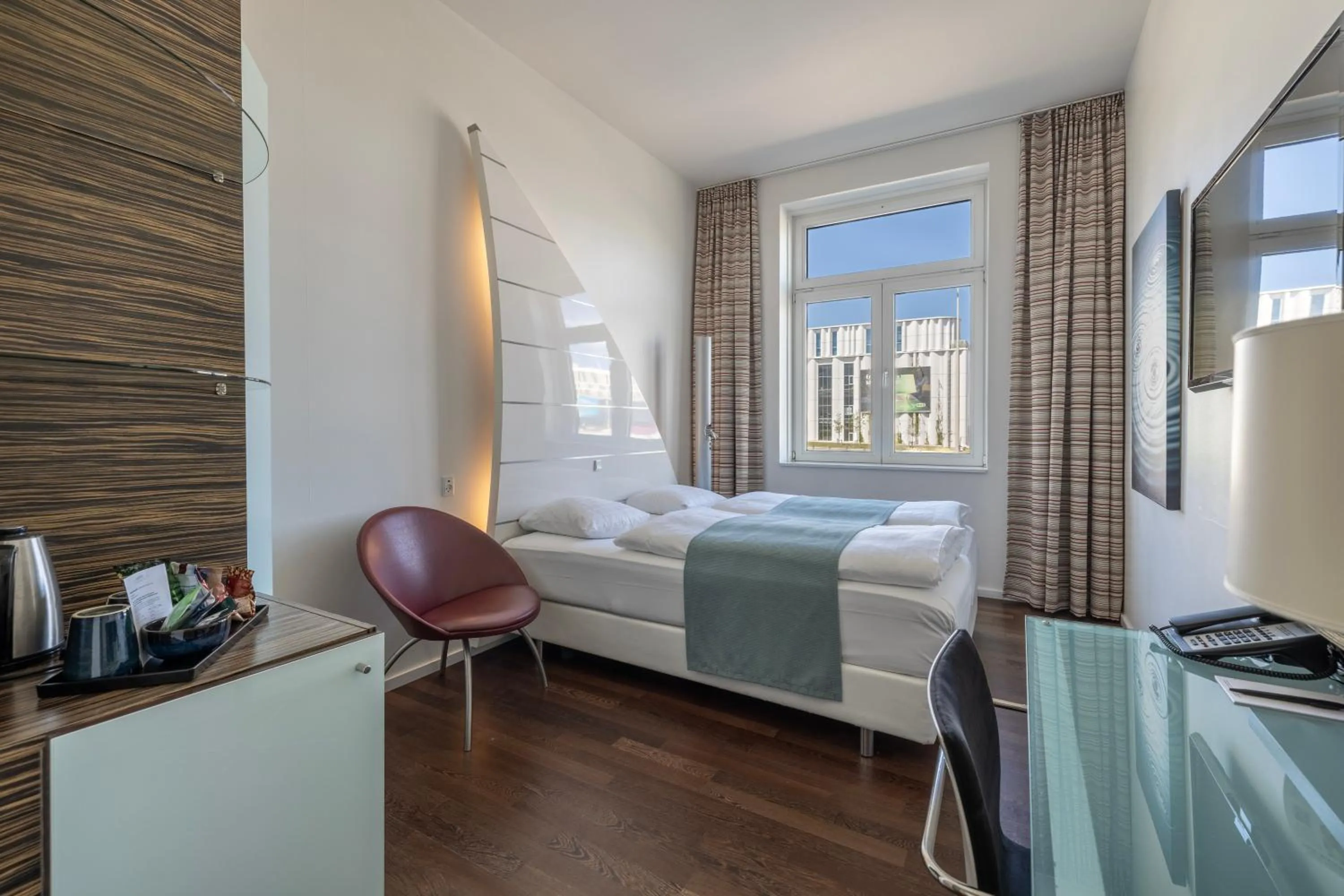 Bed in Copenhagen Island Hotel