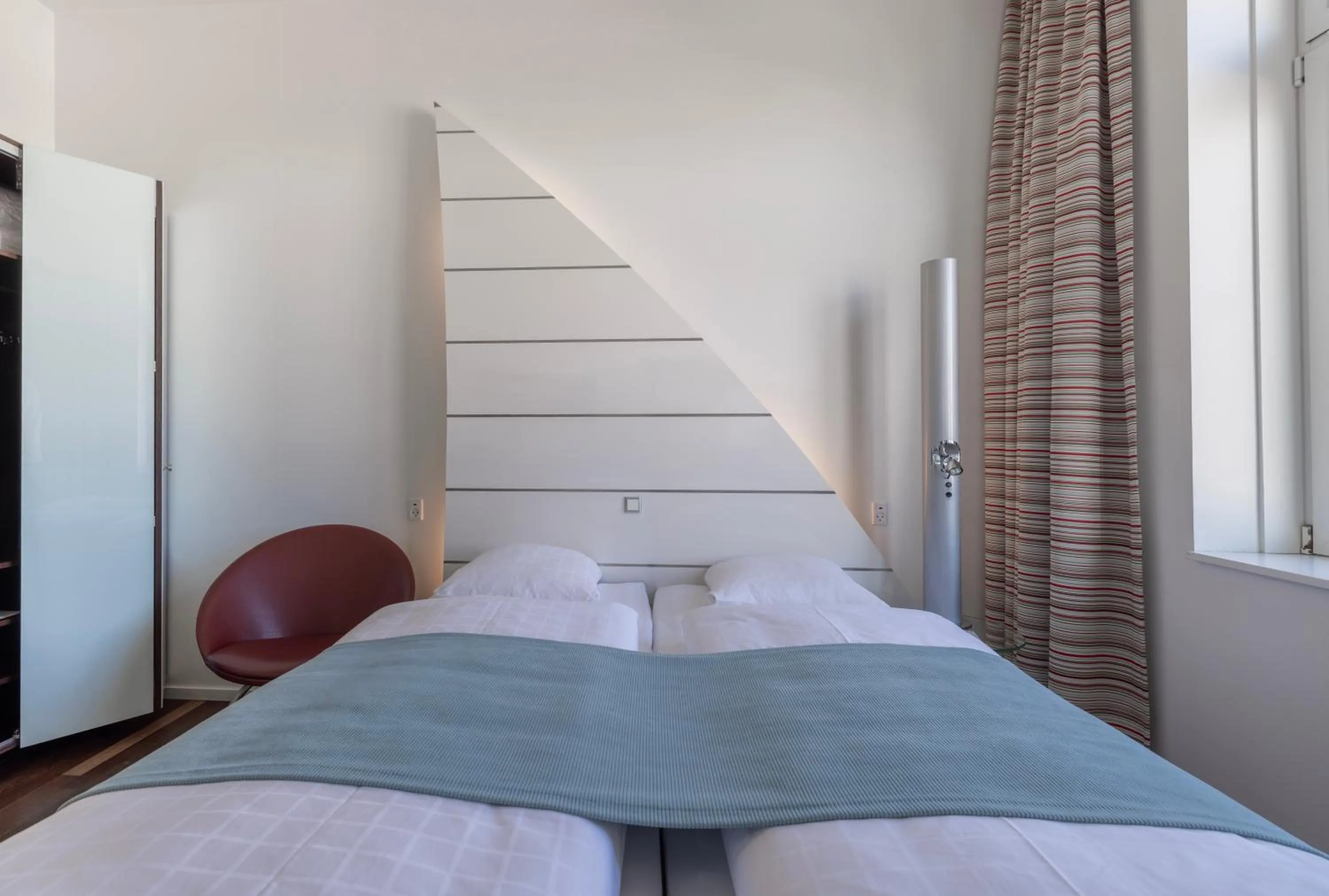 Bed in Copenhagen Island Hotel