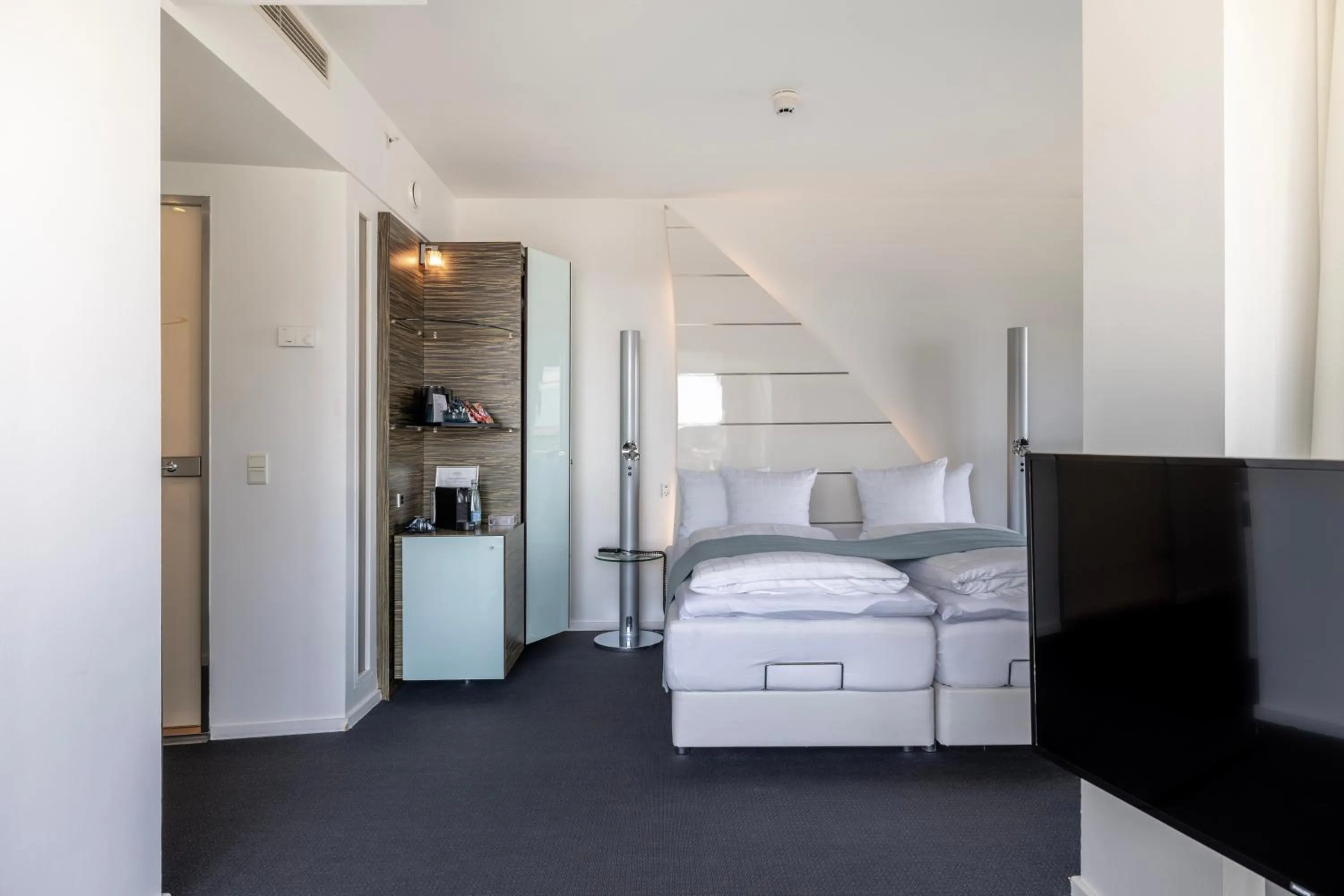 Bed in Copenhagen Island Hotel