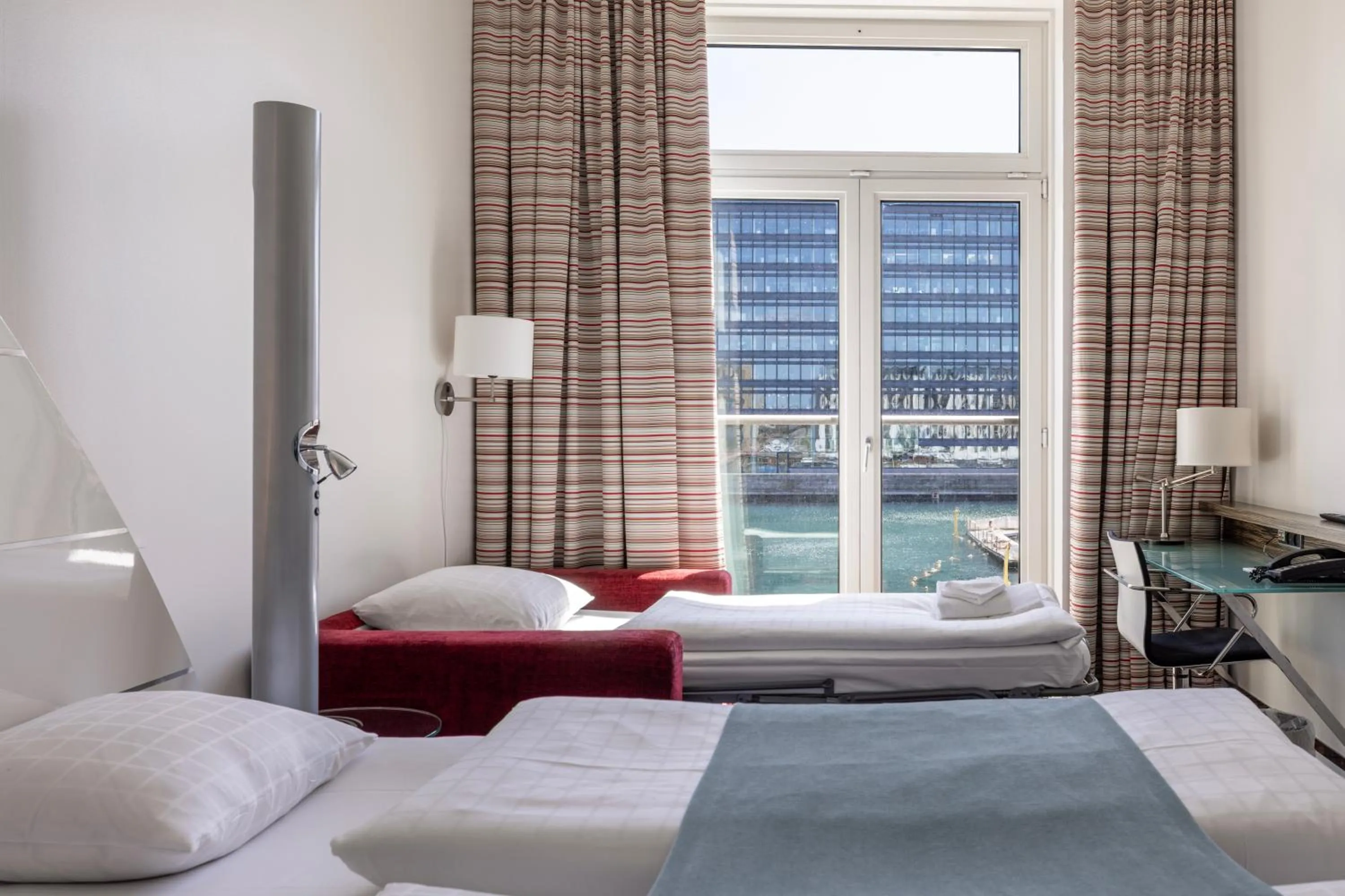 Bed in Copenhagen Island Hotel