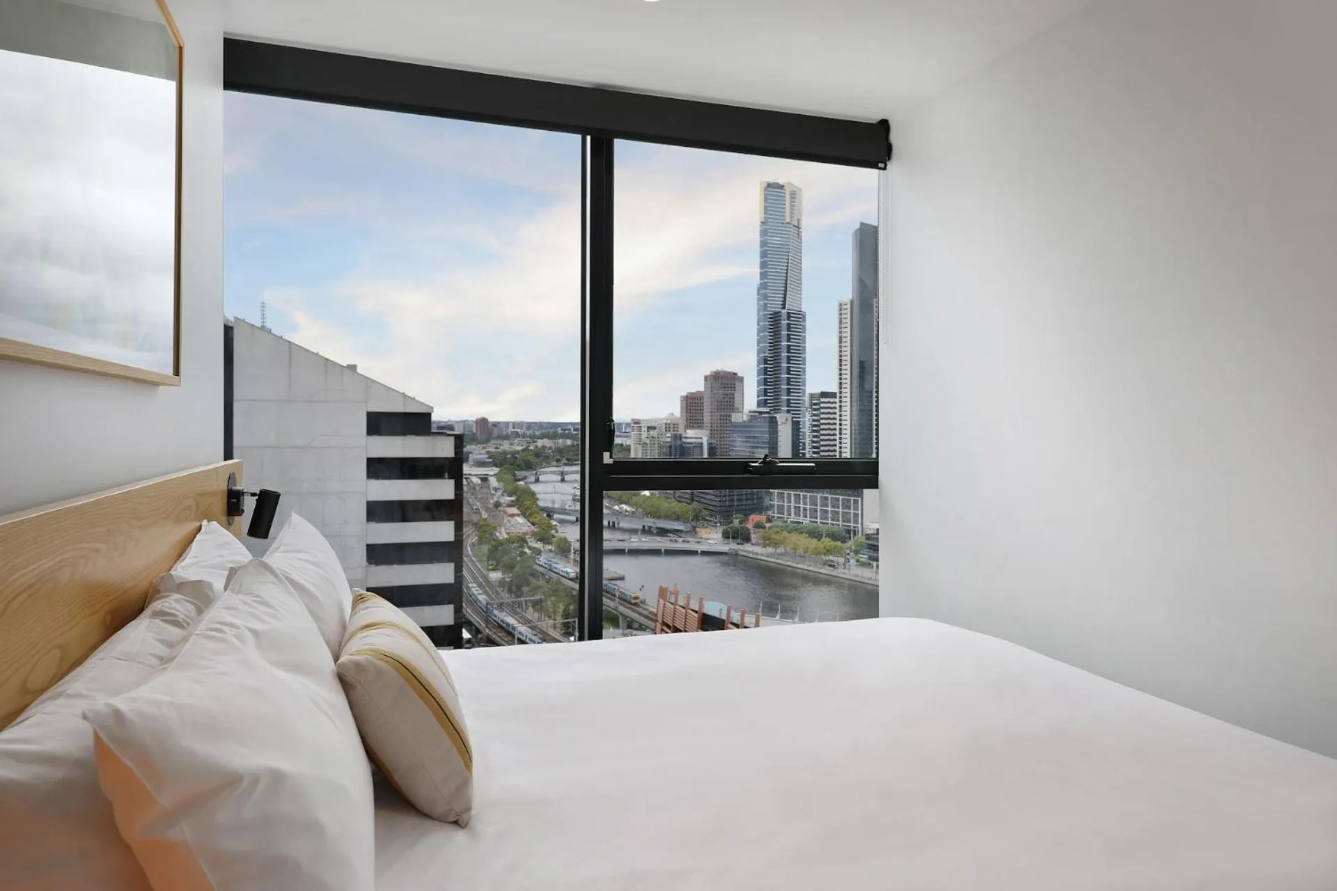 Bed in The Canvas Apartment Hotel