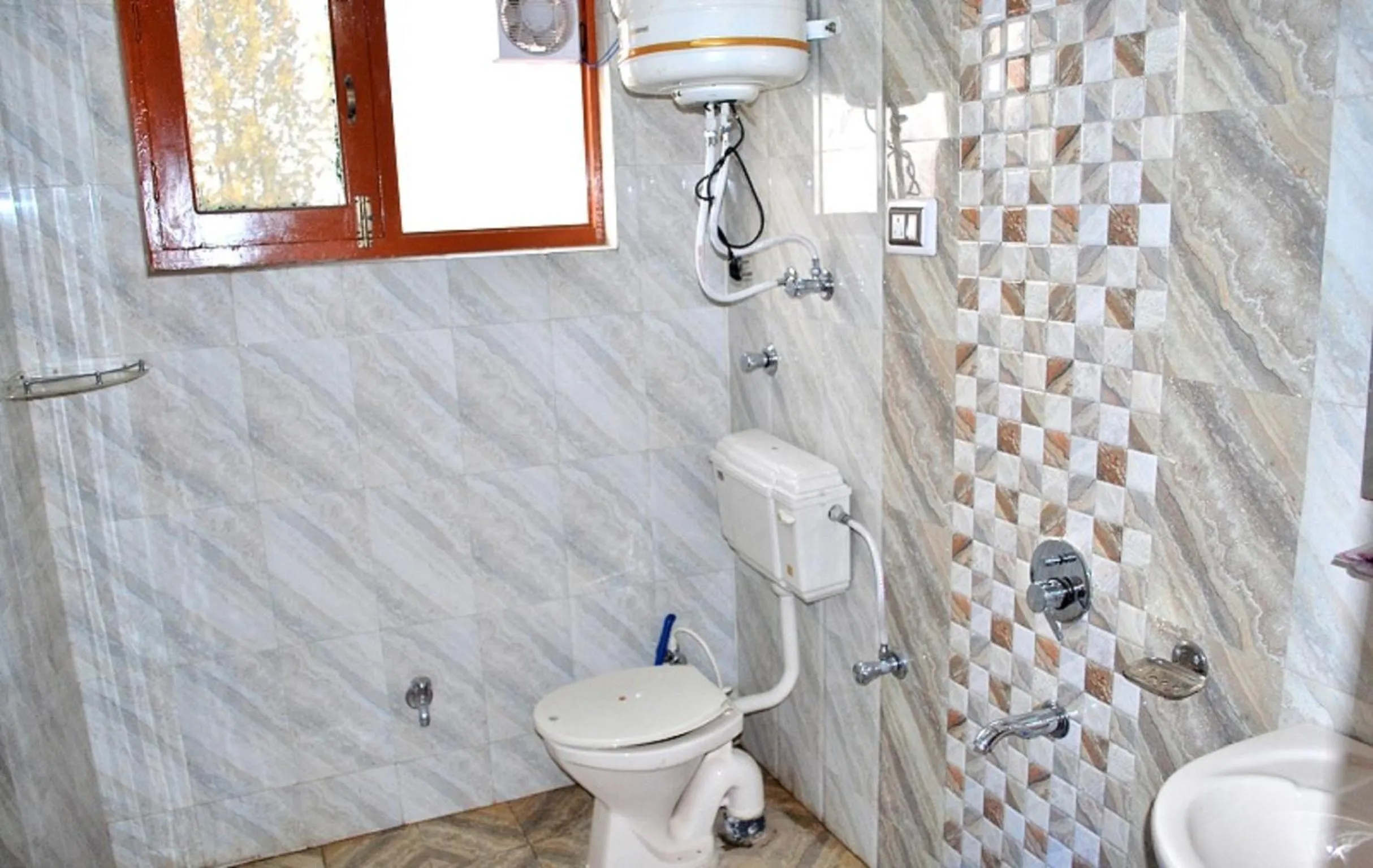 Bathroom in FabHotel Grand Comforts