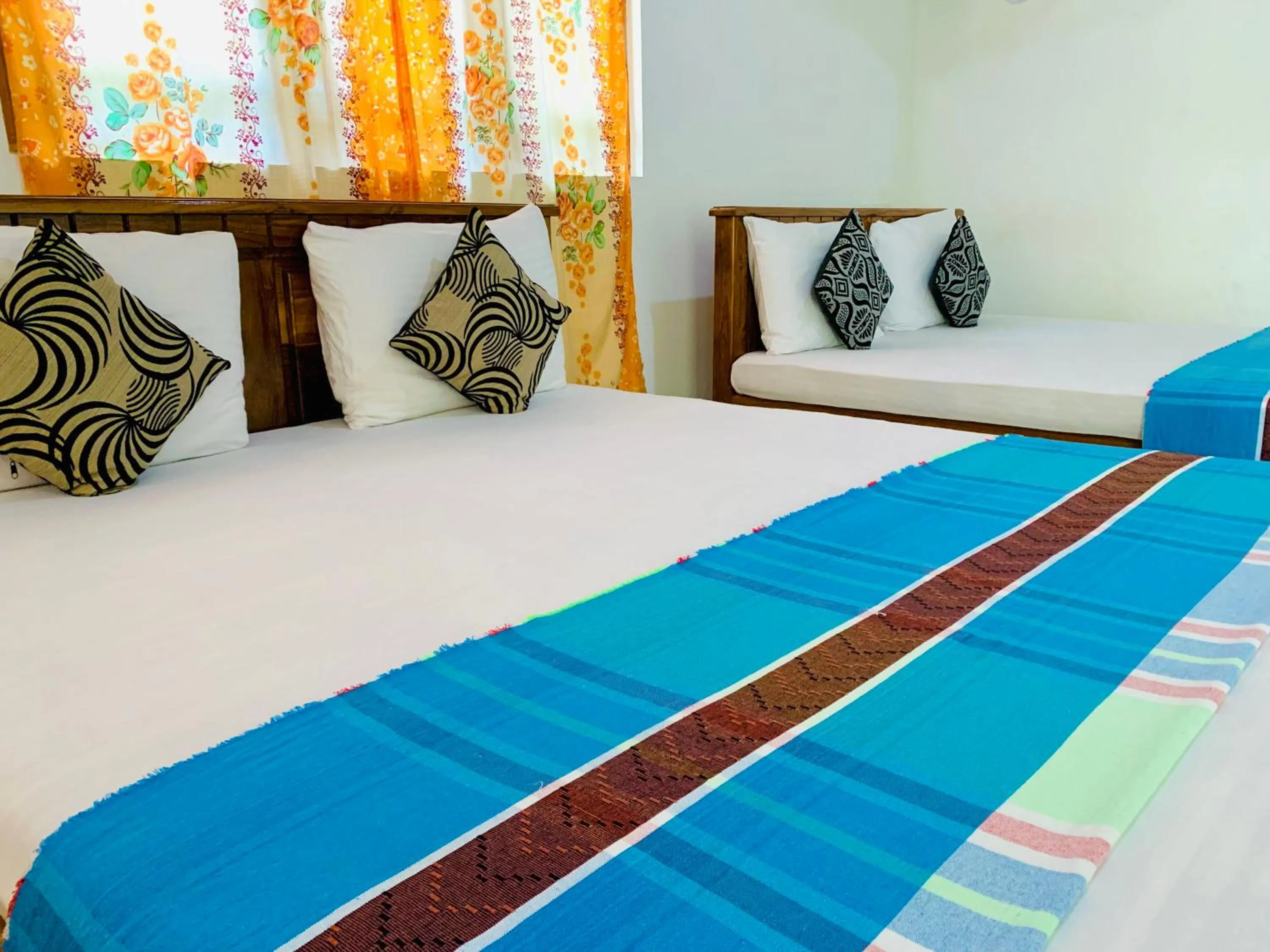 Bed in Rich Resort & Restaurant