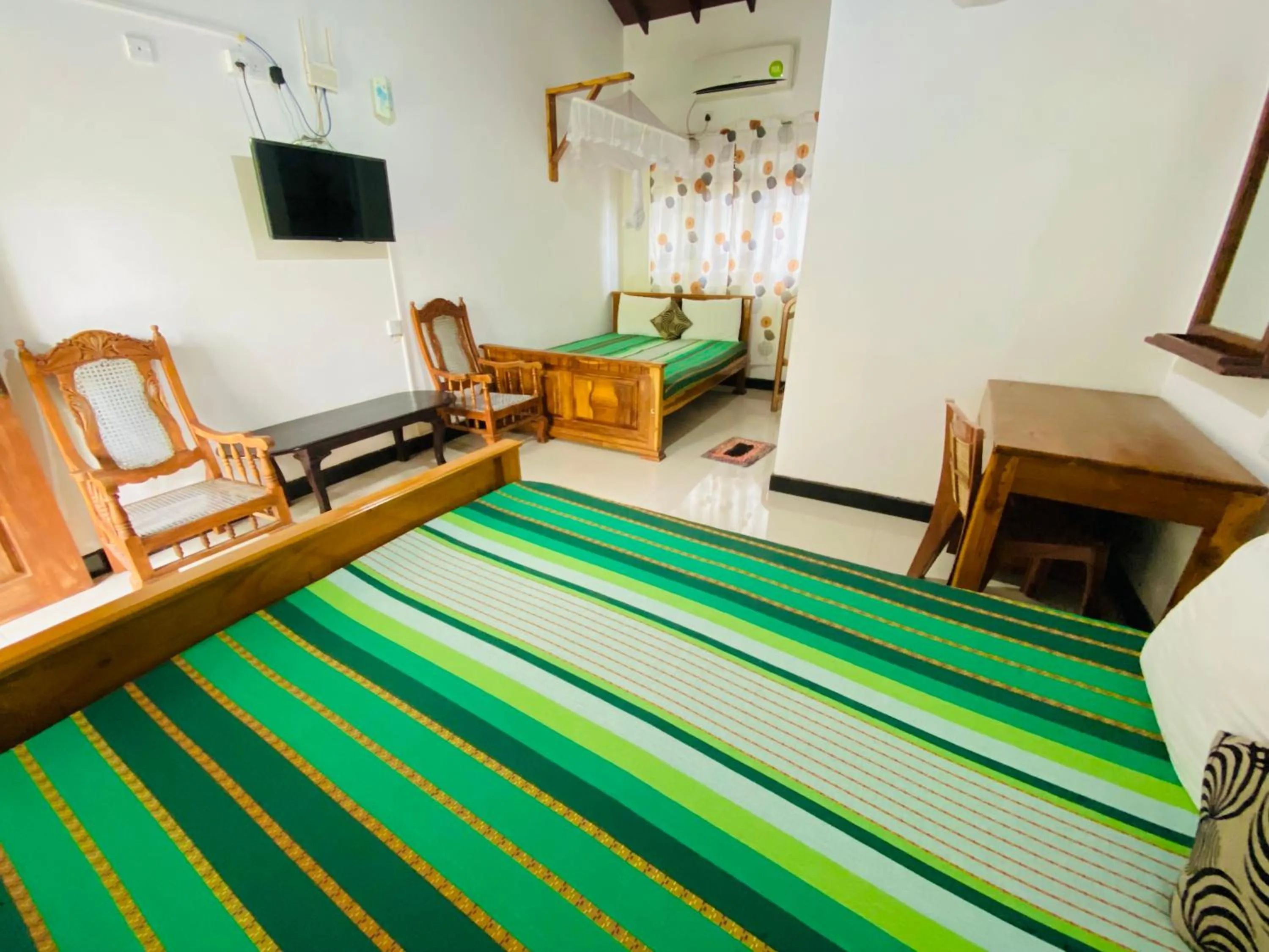 Bed in Rich Resort & Restaurant