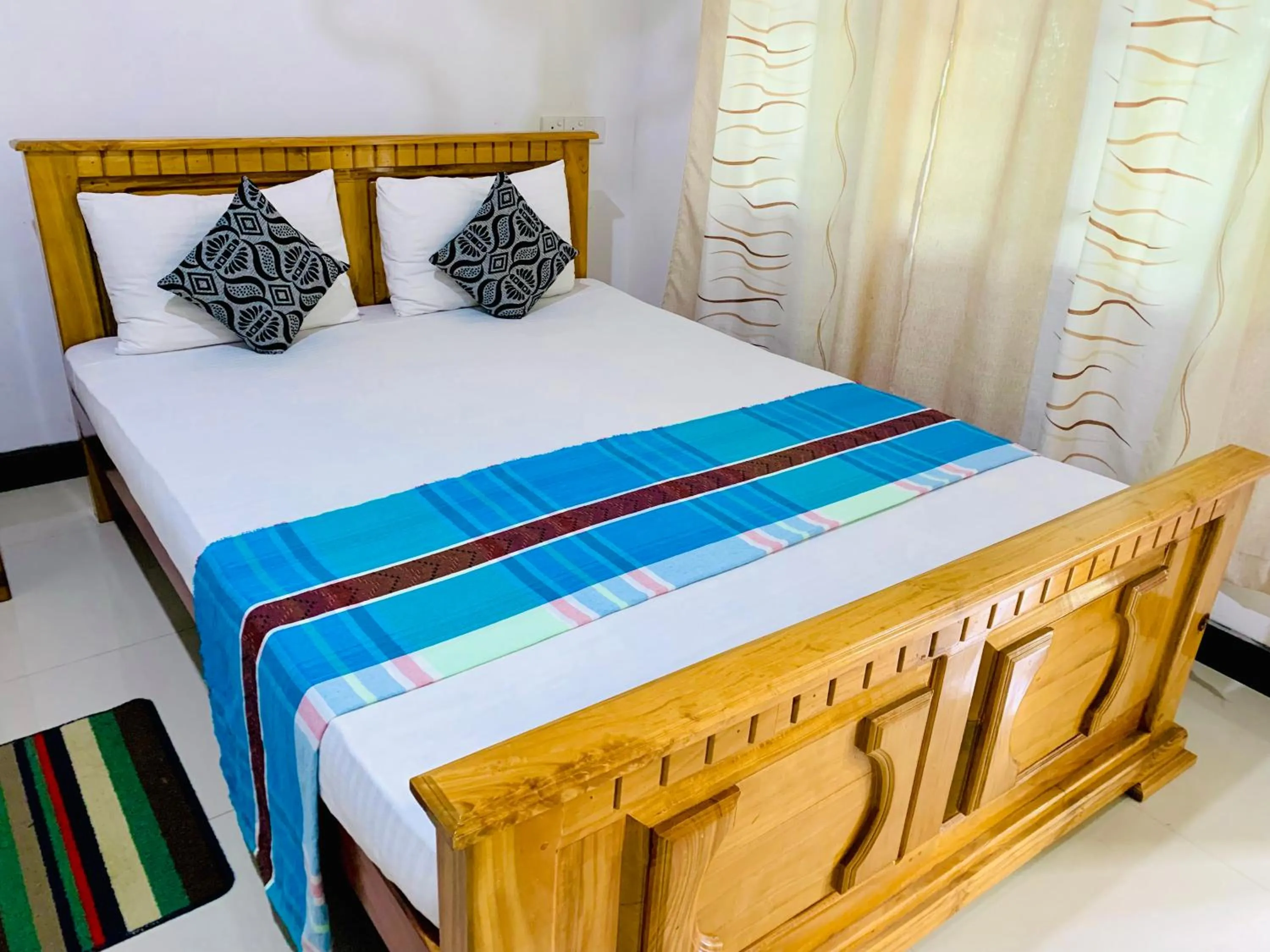 Bed in Rich Resort & Restaurant