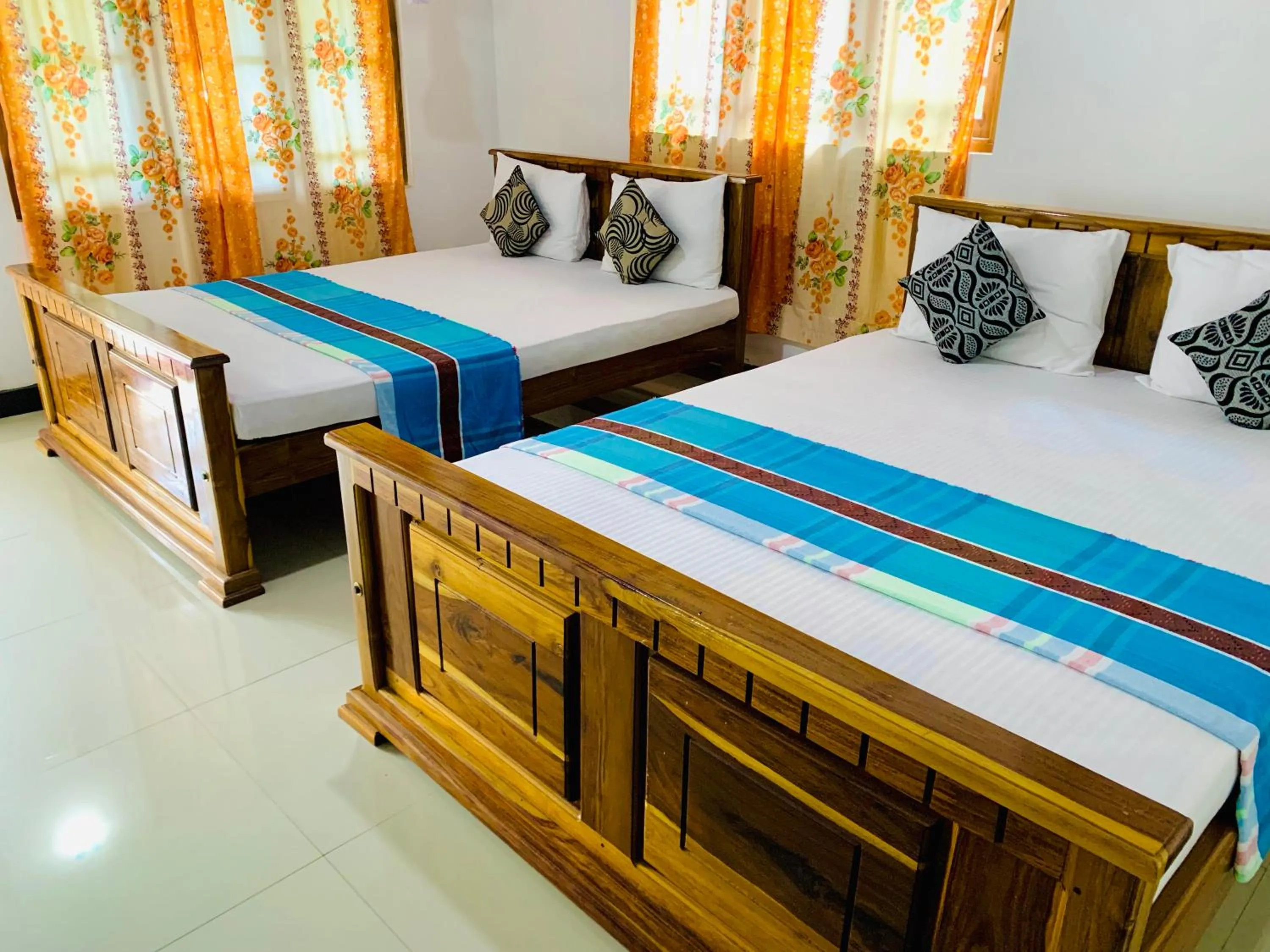 Bed in Rich Resort & Restaurant