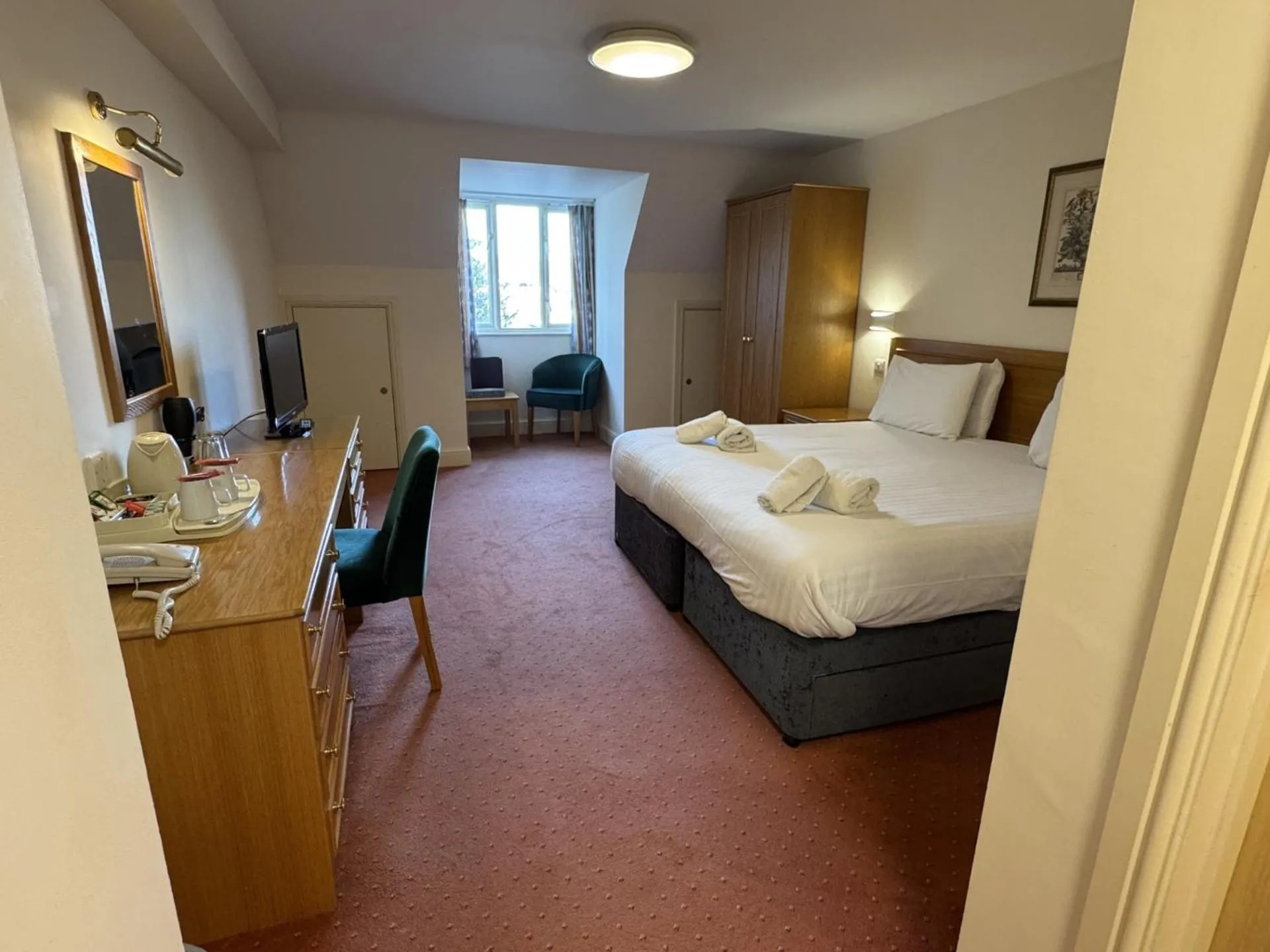 Bed in Louisa Lodge & Purbeck House Hotel