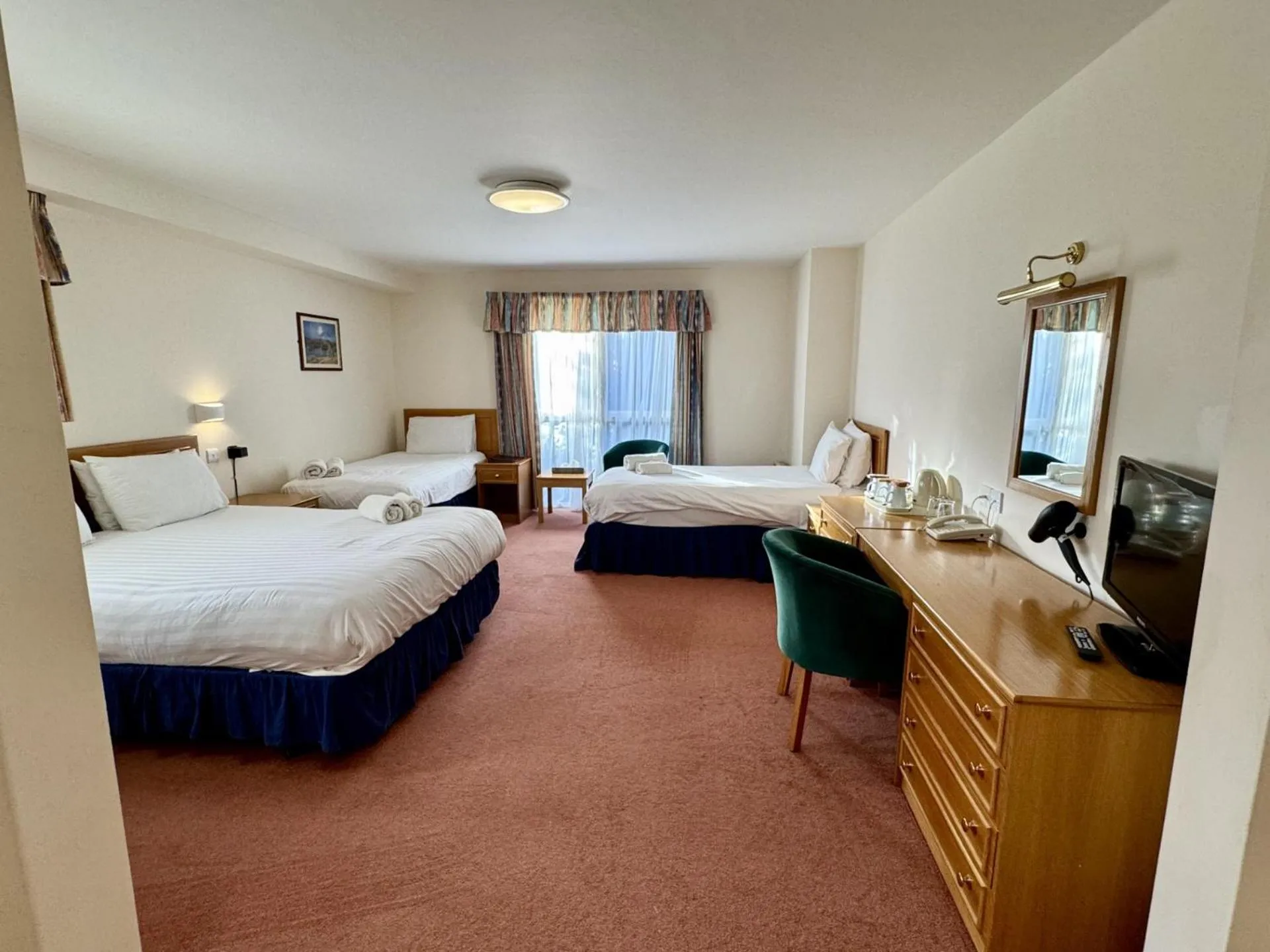 Bed in Louisa Lodge & Purbeck House Hotel