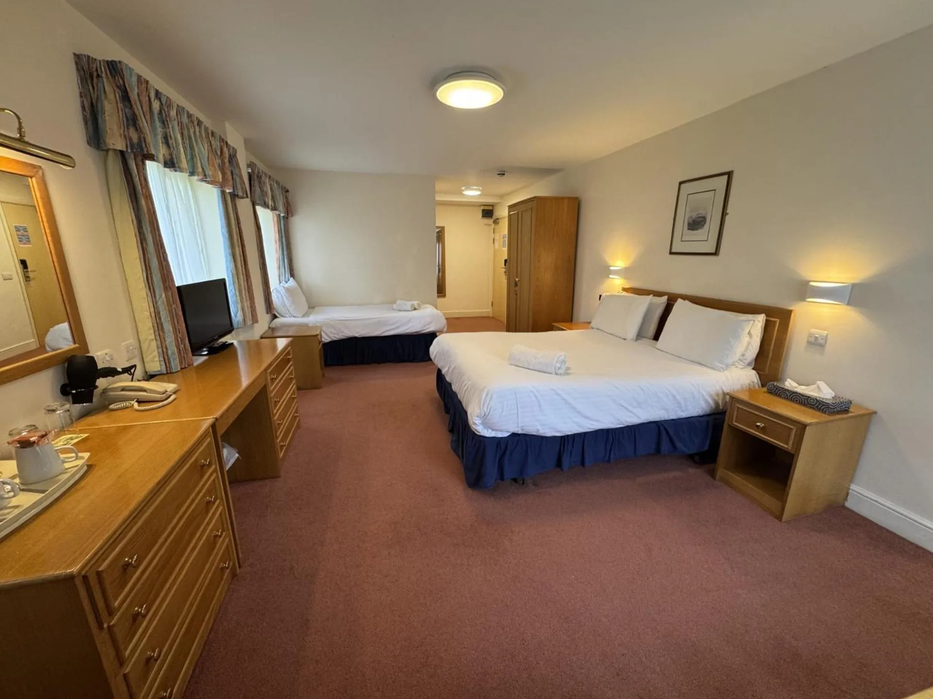 Bed in Louisa Lodge & Purbeck House Hotel