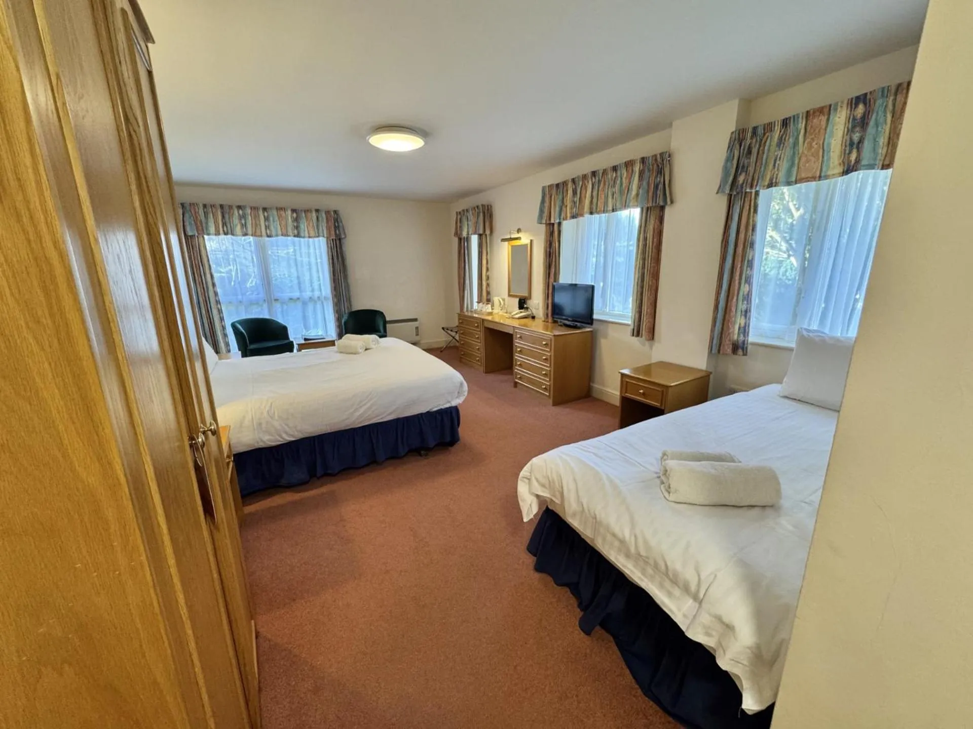 Bed in Louisa Lodge & Purbeck House Hotel