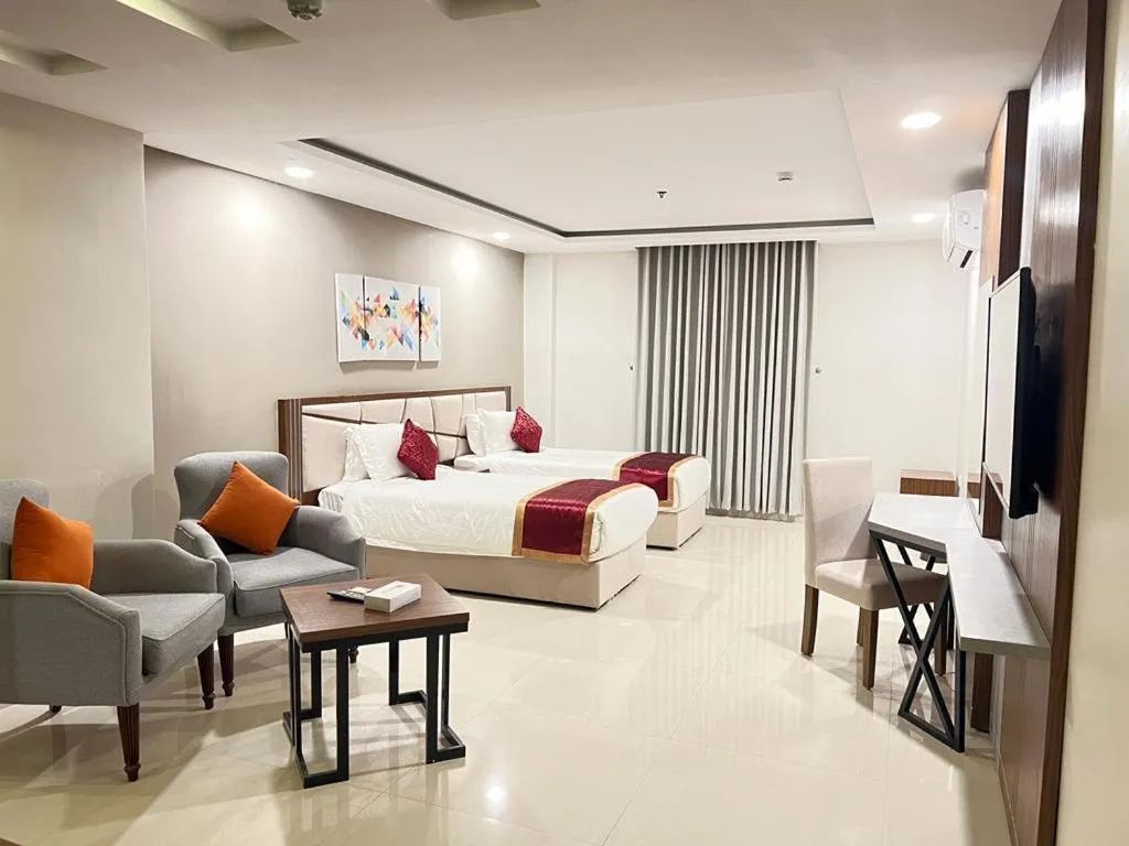 Bed in Remaz Suites Hotel