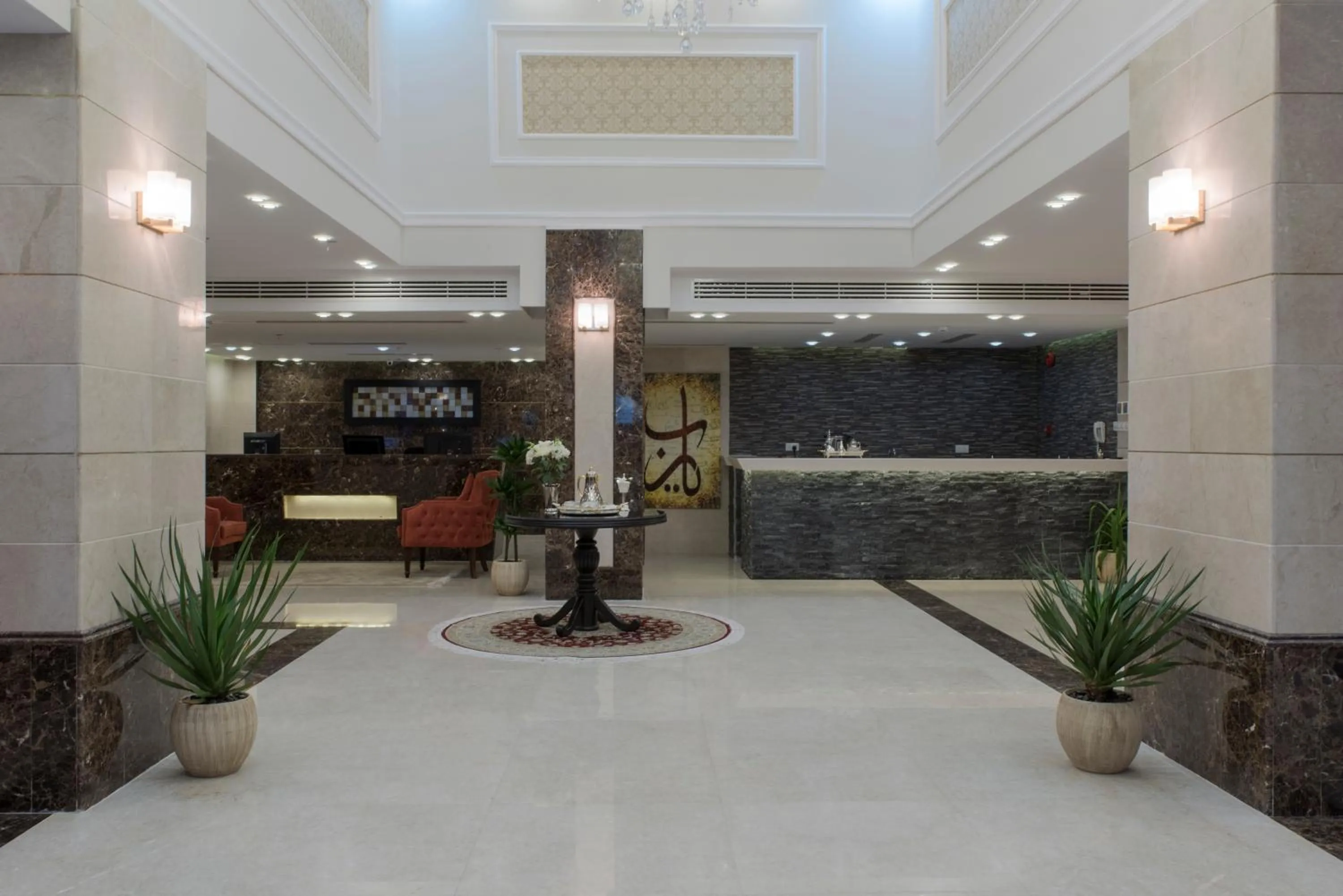 Lobby or reception in Remaz Suites Hotel