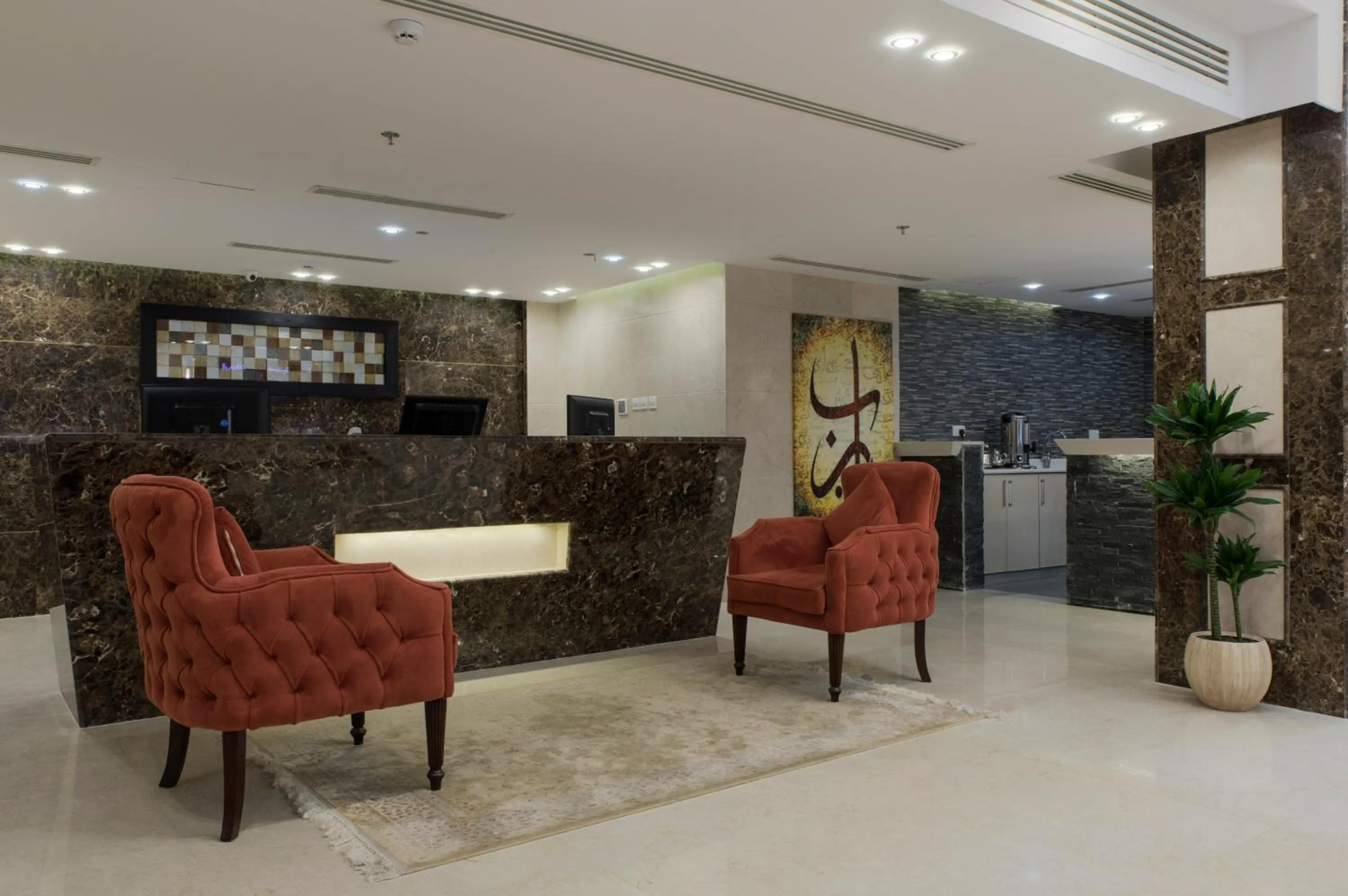 Lobby or reception in Remaz Suites Hotel