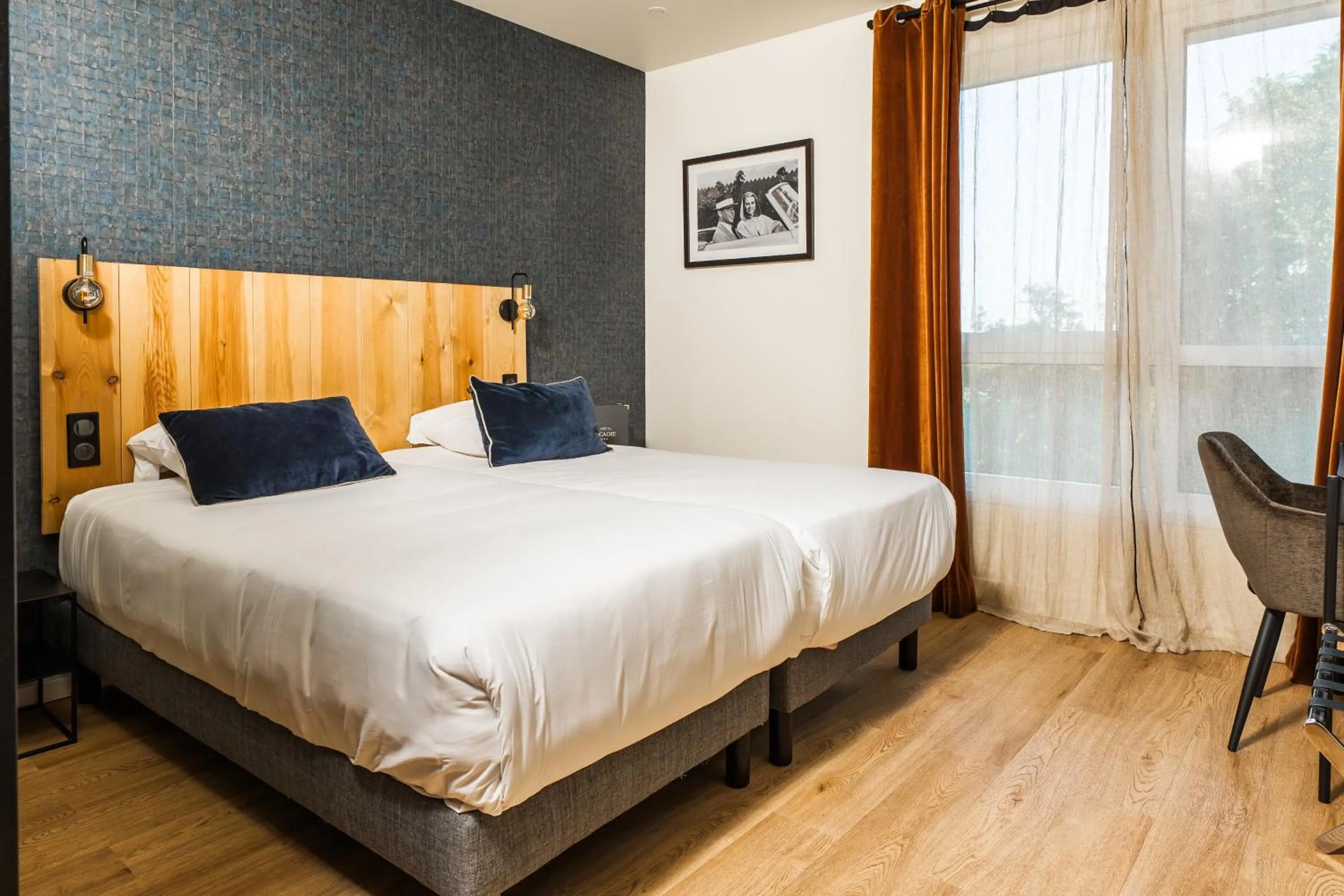 Bed in Hotel Acadie Eragny