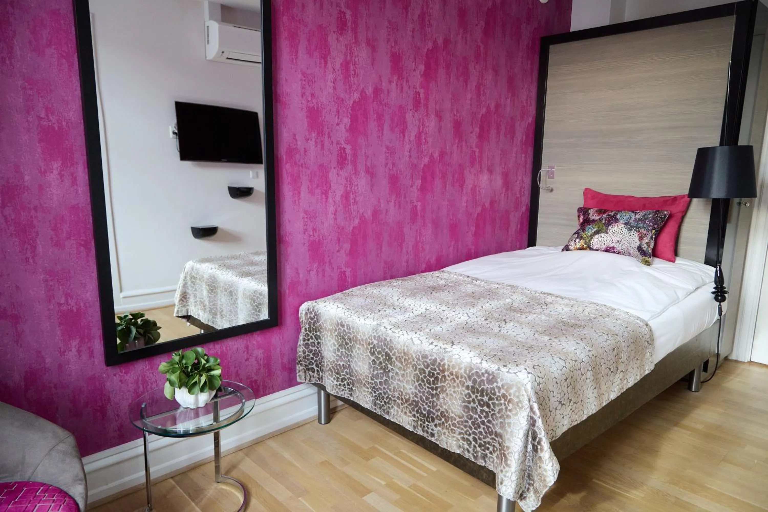 Bed in Andersen Boutique Hotel