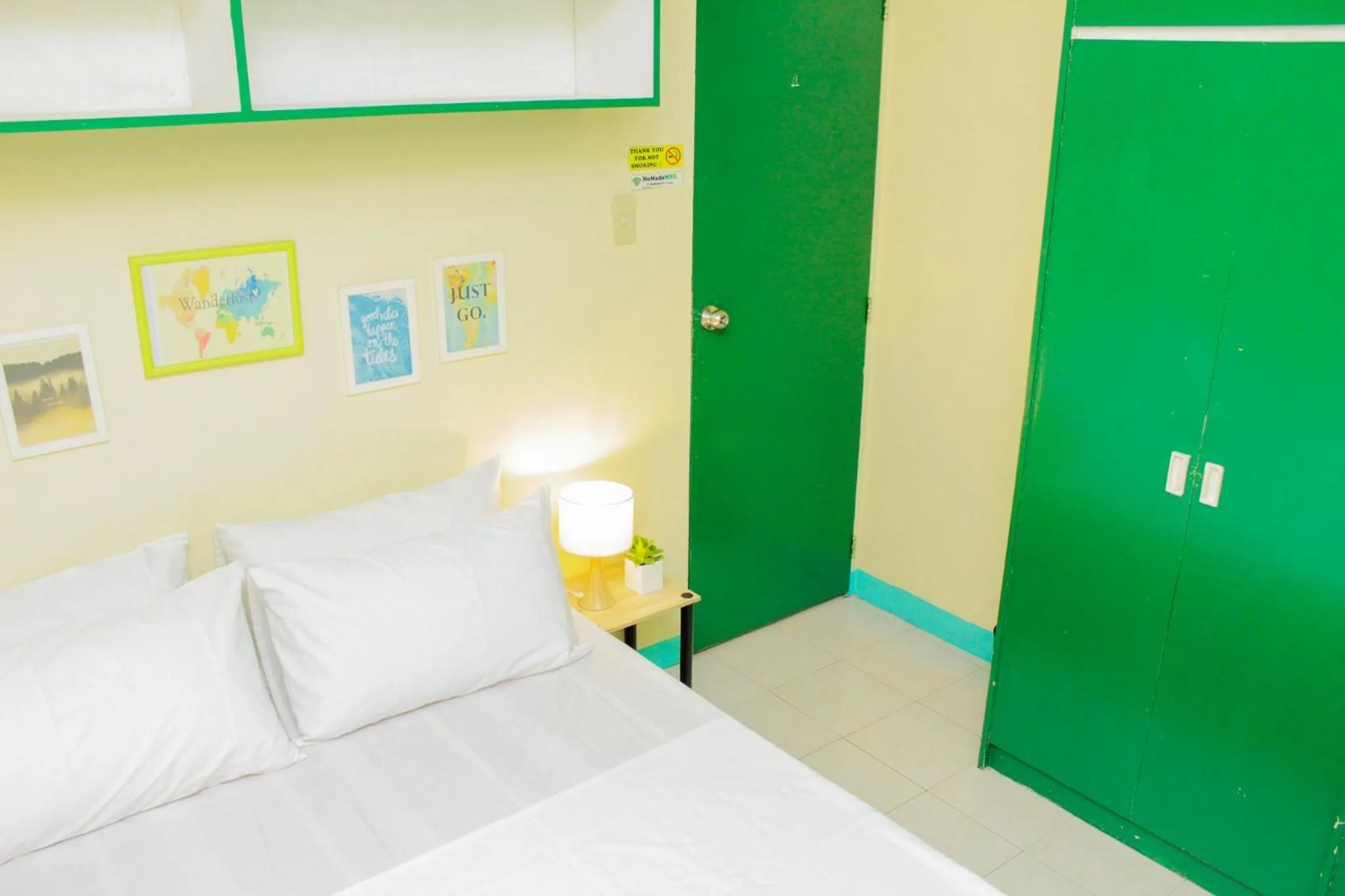 Bed in Backpackers Homestay - NomadsMNL