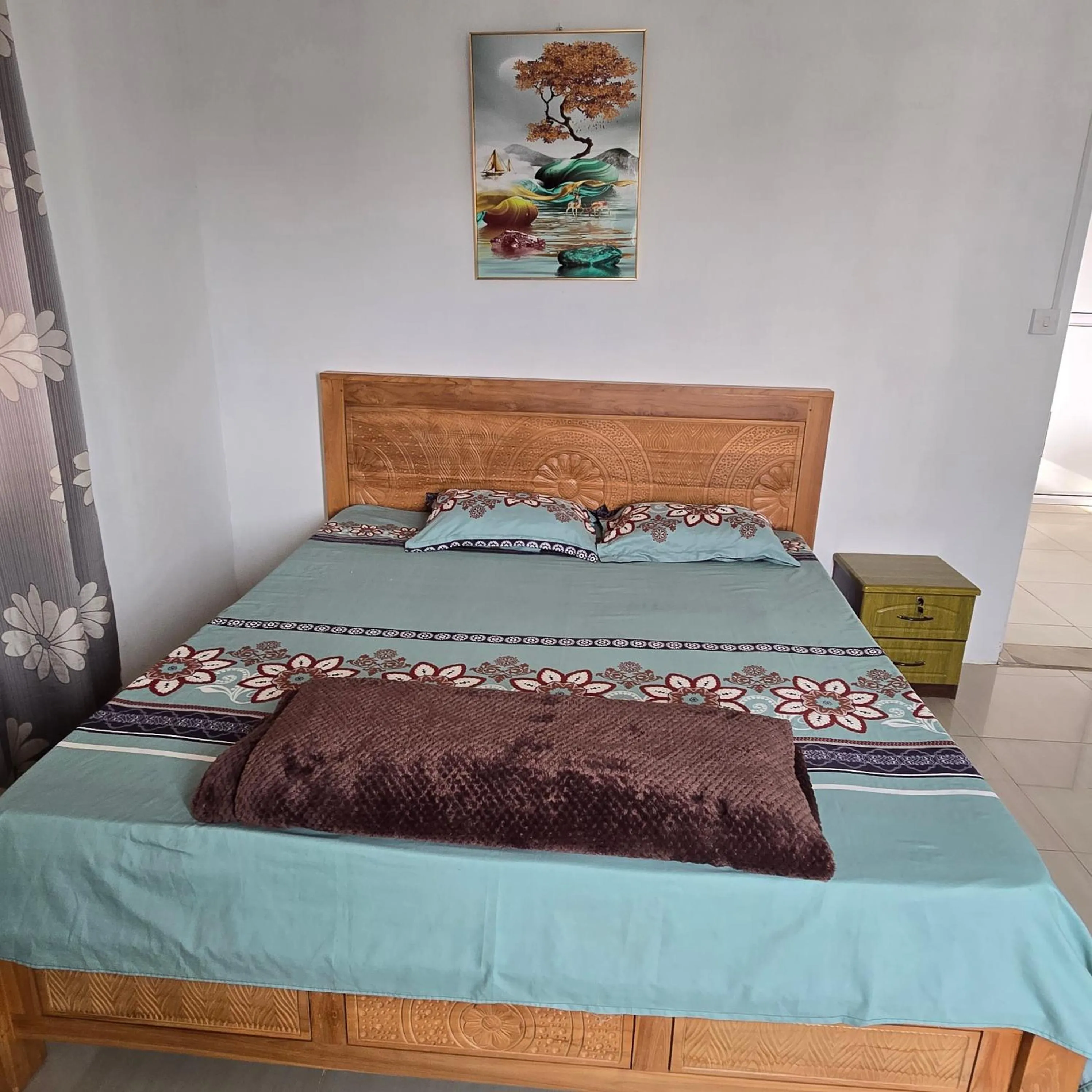 Bed in Green Discovery B&B Tamarind Falls 7 Cascades