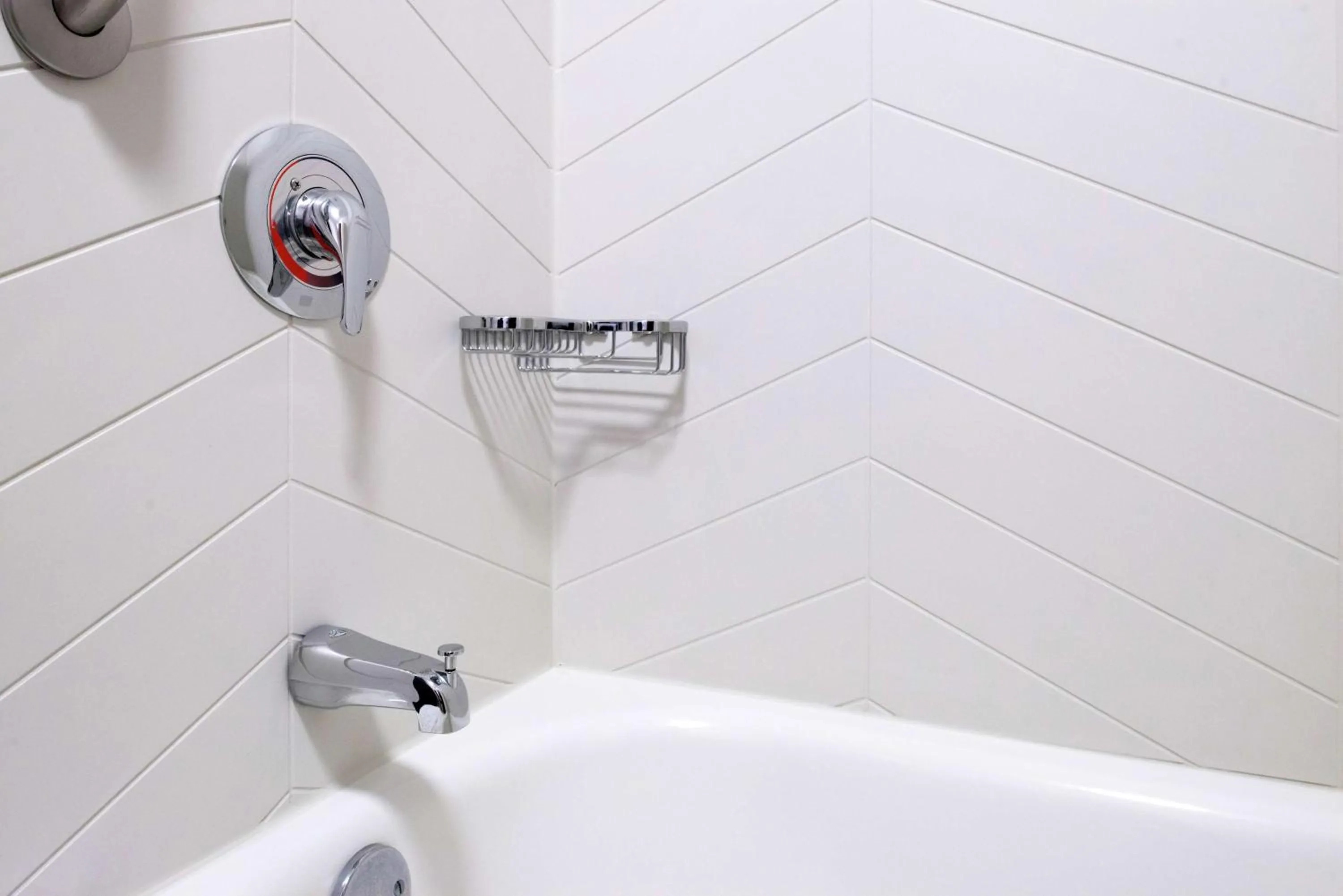 Bathroom in Joinery Hotel Pittsburgh, Curio Collection by Hilton