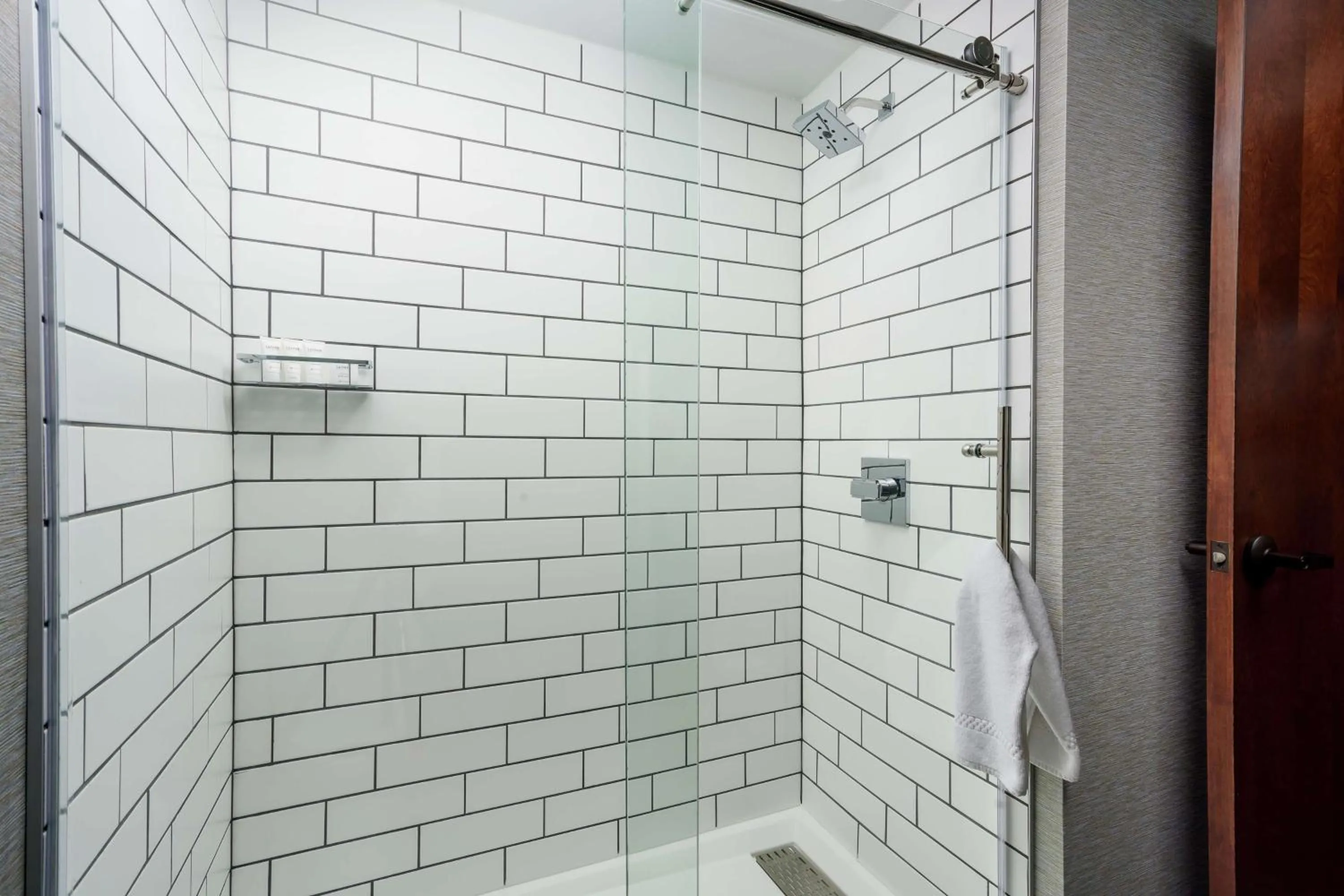 Bathroom in Joinery Hotel Pittsburgh, Curio Collection by Hilton