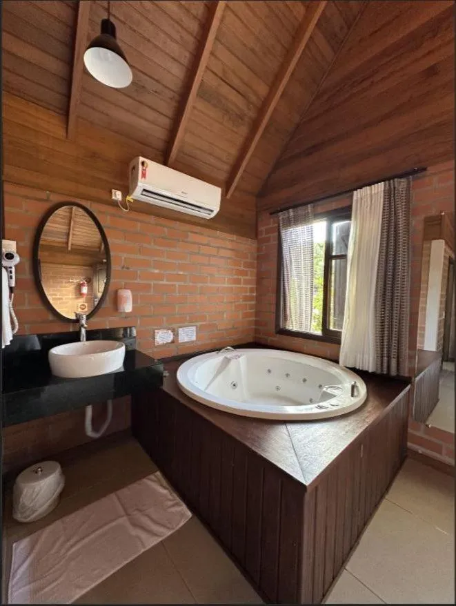 Bed in Pousada Casarão Gastehaus