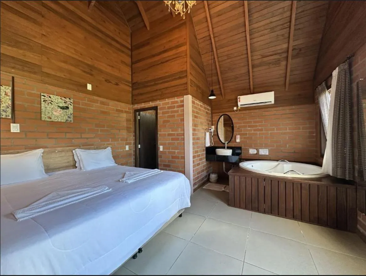 Bed in Pousada Casarão Gastehaus