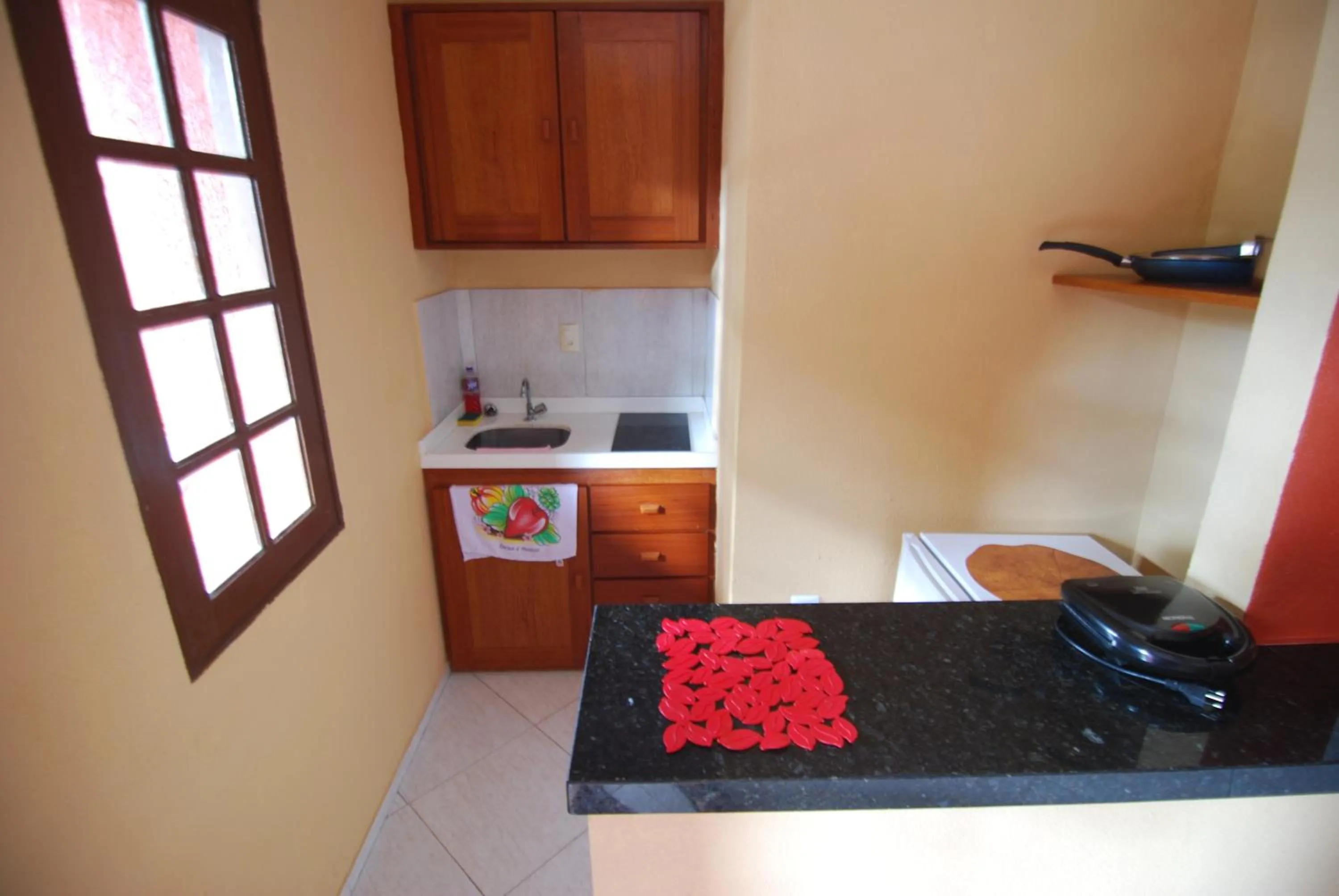 Kitchen or kitchenette in Refúgio Pousada Fortaleza