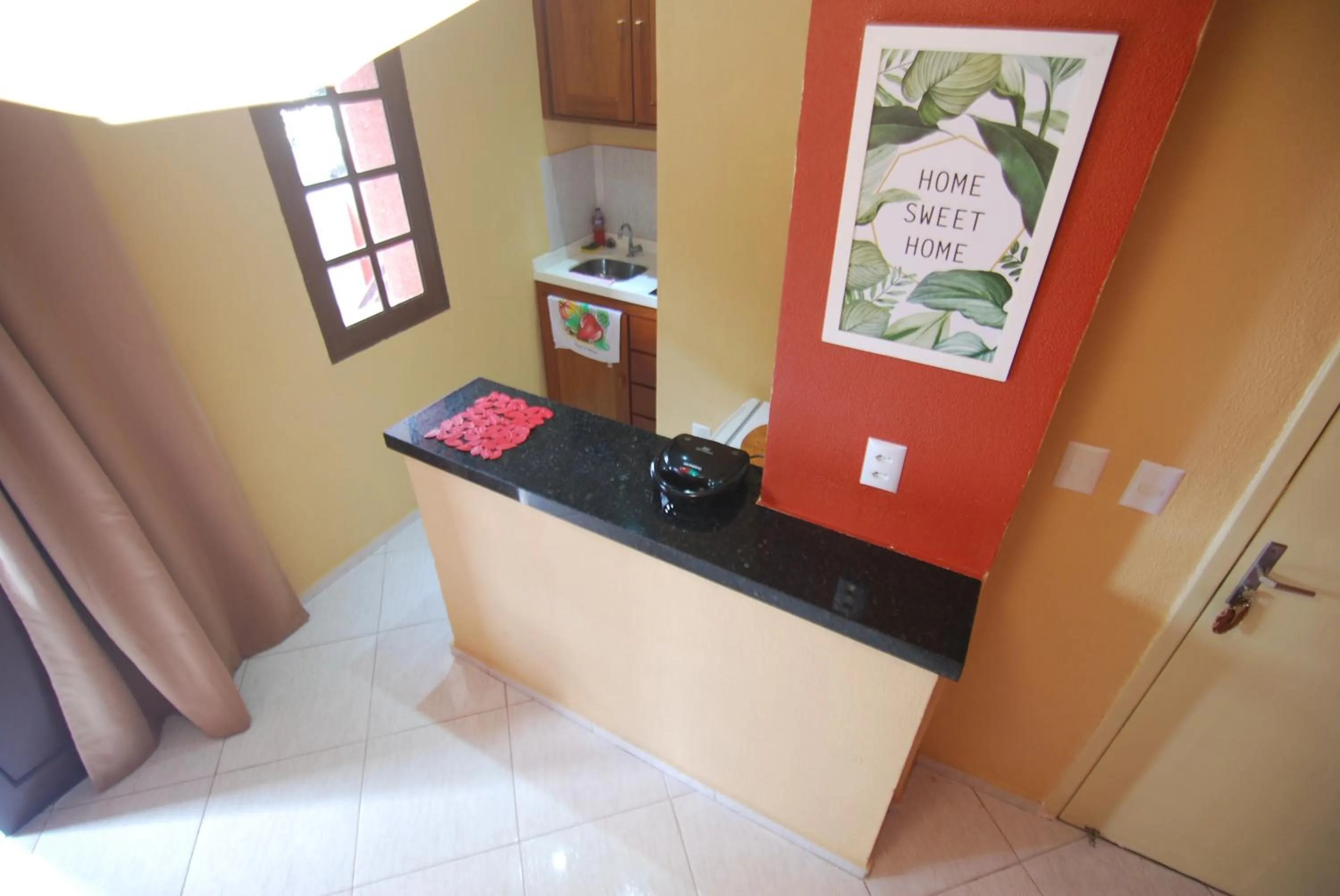 Kitchen or kitchenette in Refúgio Pousada Fortaleza