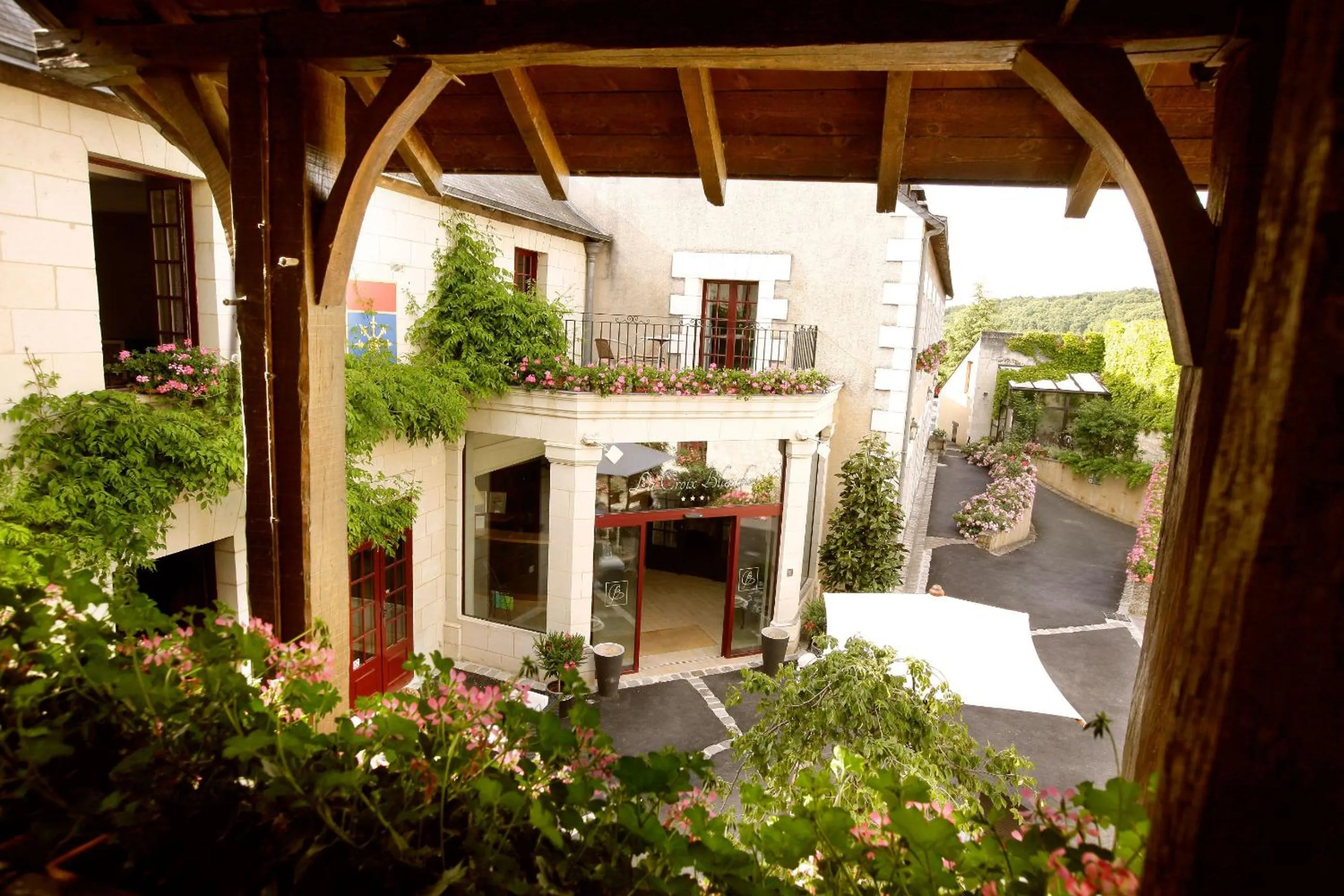 Patio in Logis Hotel La Croix Blanche Fontevraud