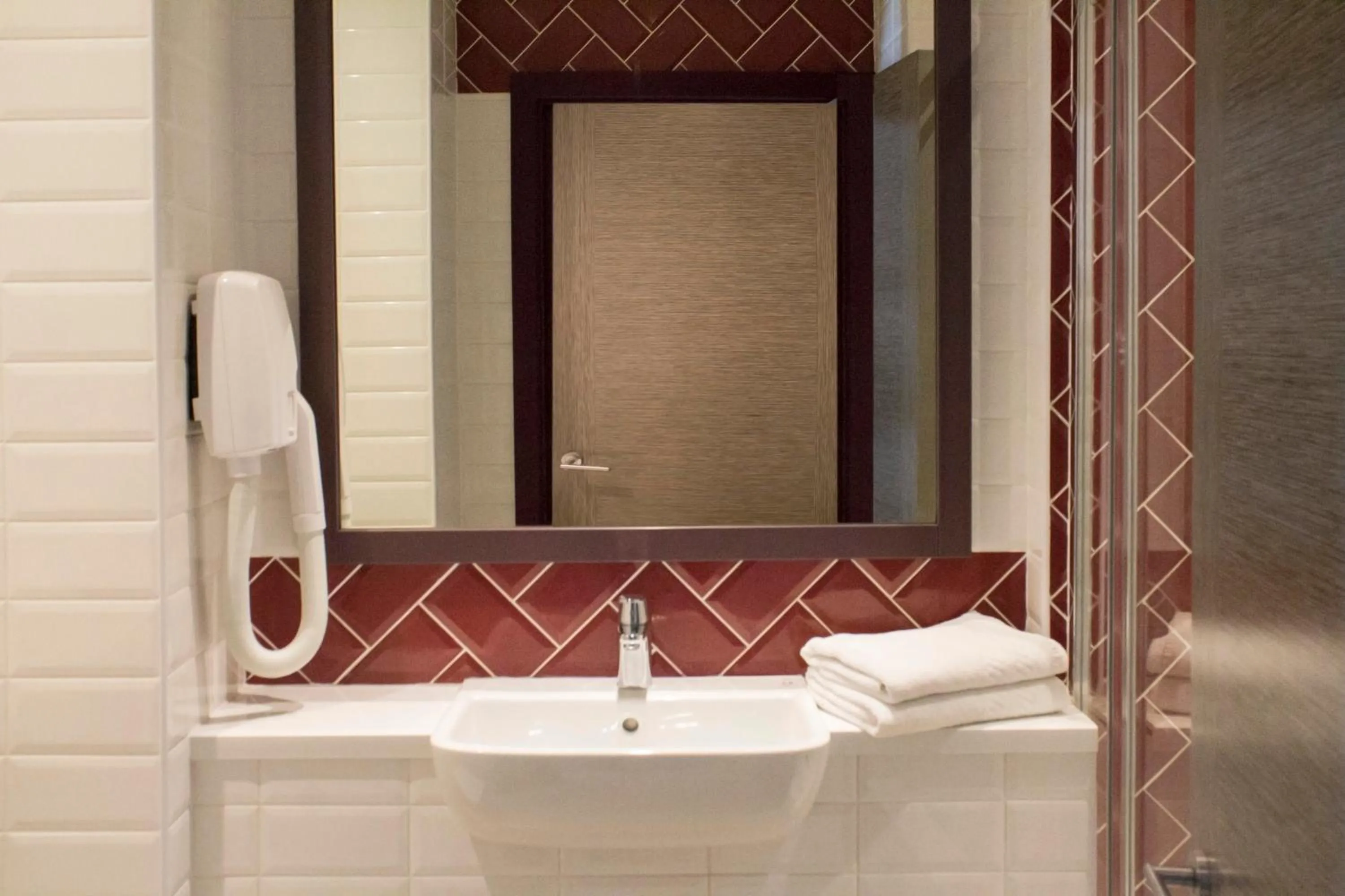 Bathroom in Best Western Plus London Wembley Hotel