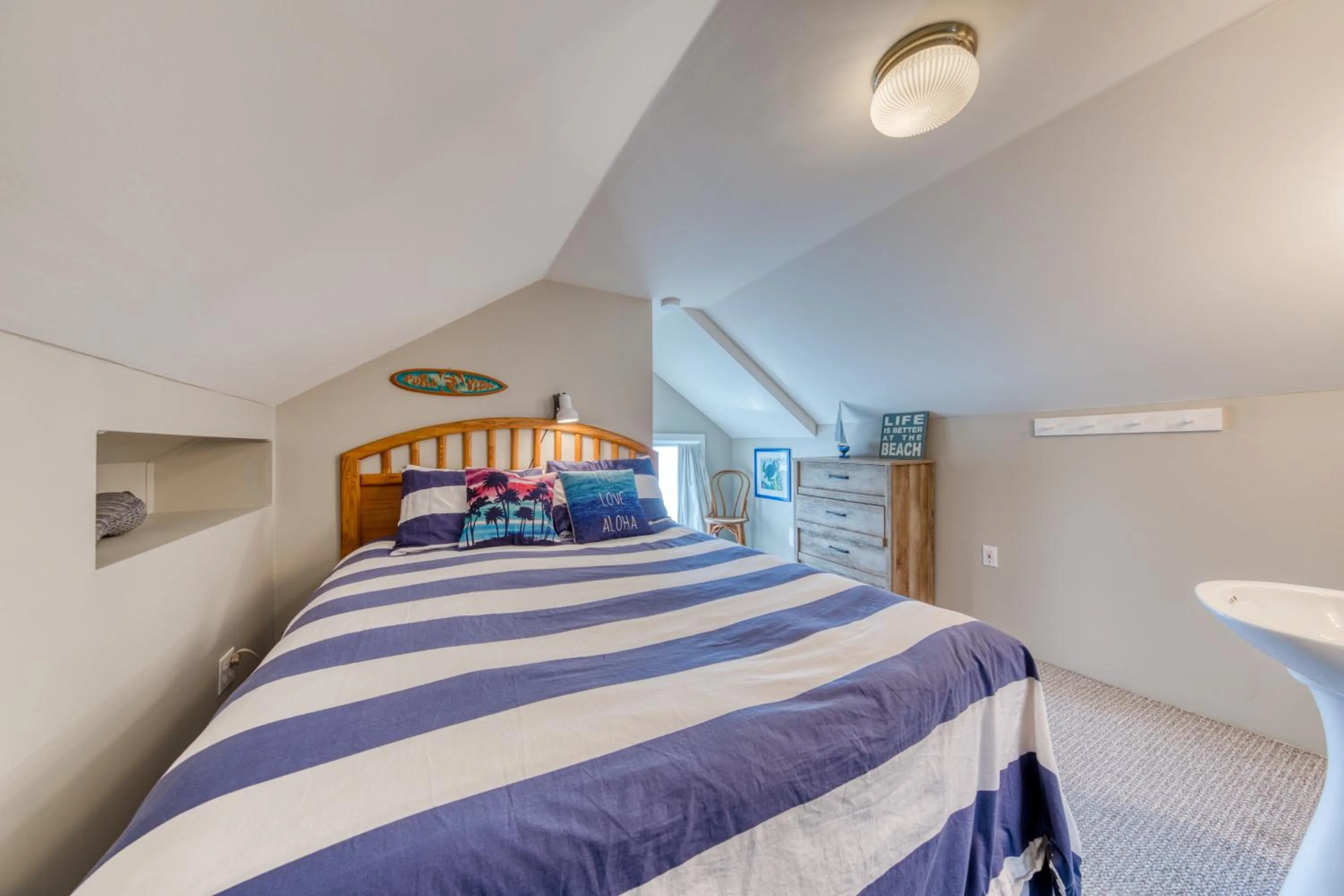 Bed in Oceanfront Cottage