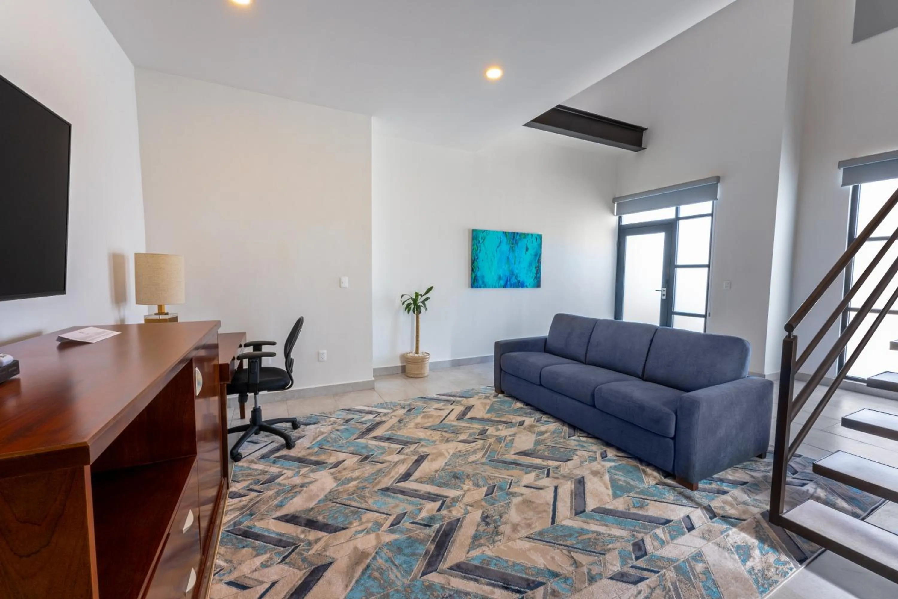 Communal lounge/ TV room in Laguna Shores Resort