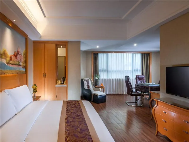 Bed in Vienna International Hotel (Shen Zhen Buji Dafen shop)